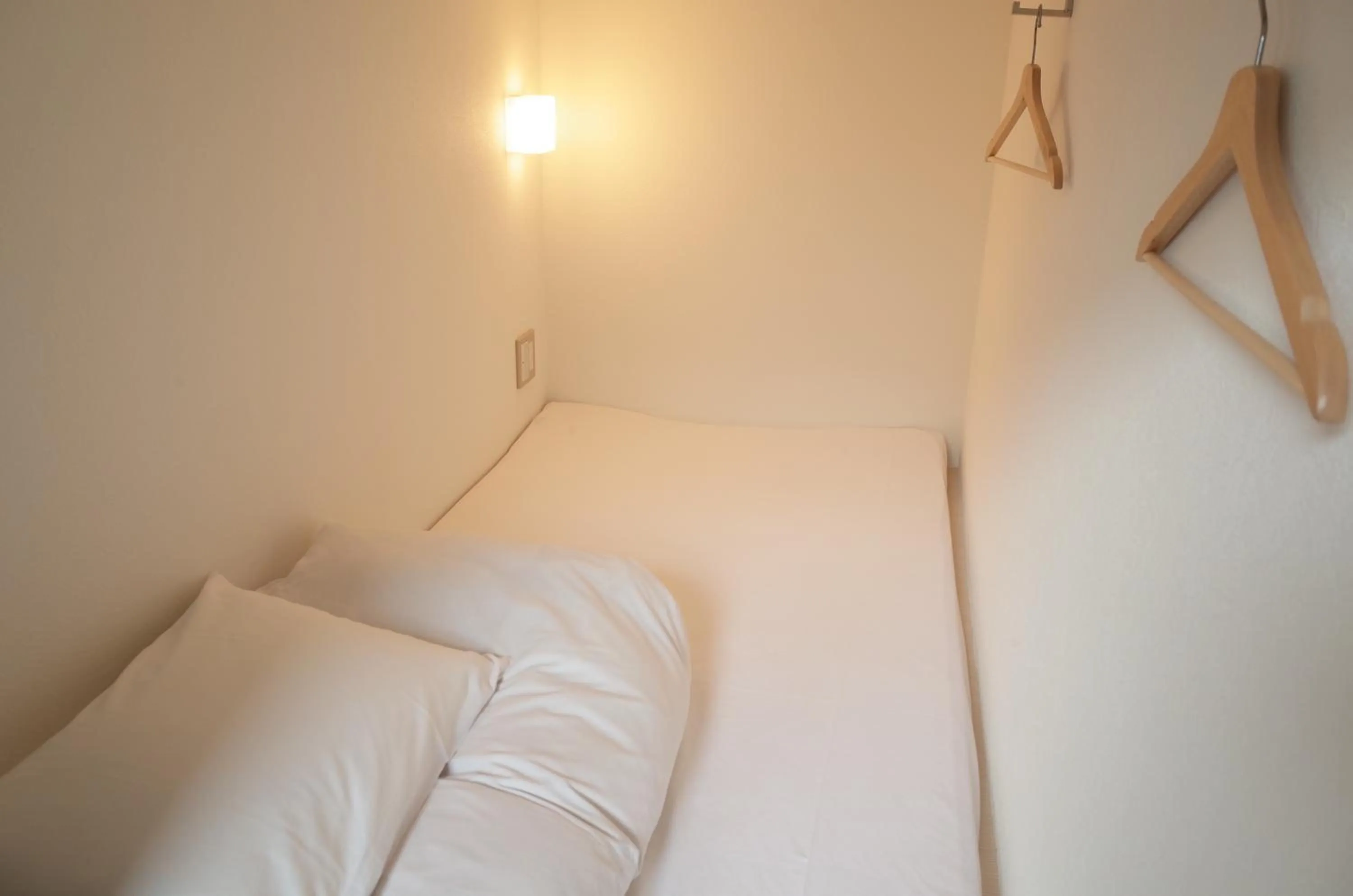 Bedroom, Bed in bnb+Atami Resort