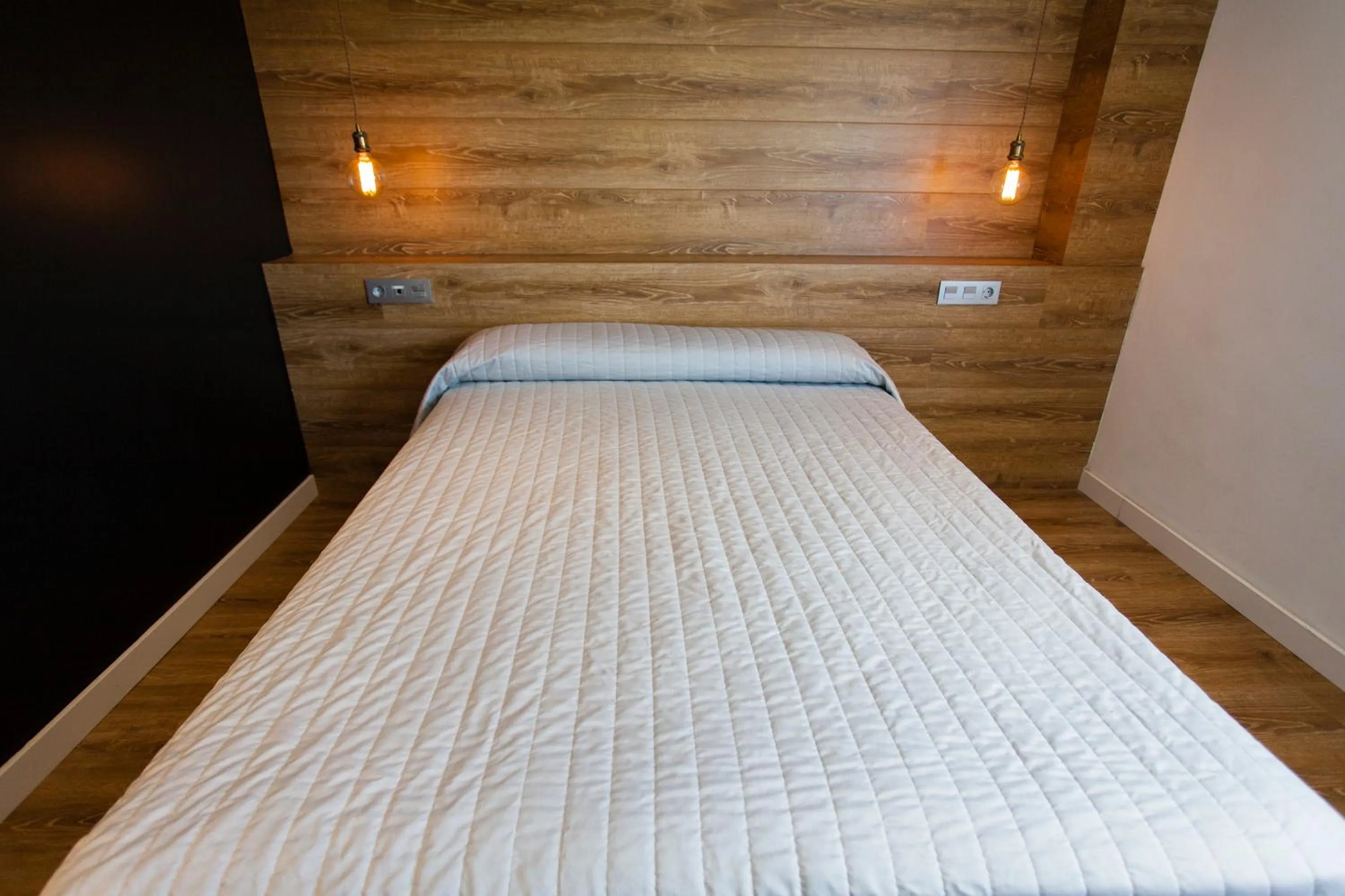 Bed in HOTEL ALCAZAR