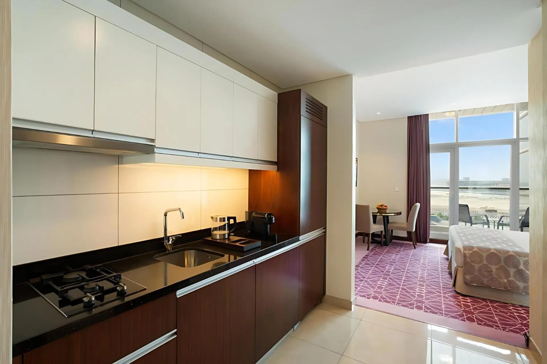 Kitchen or kitchenette in Royal Continental Suites Business Bay - Deluxe Apartments