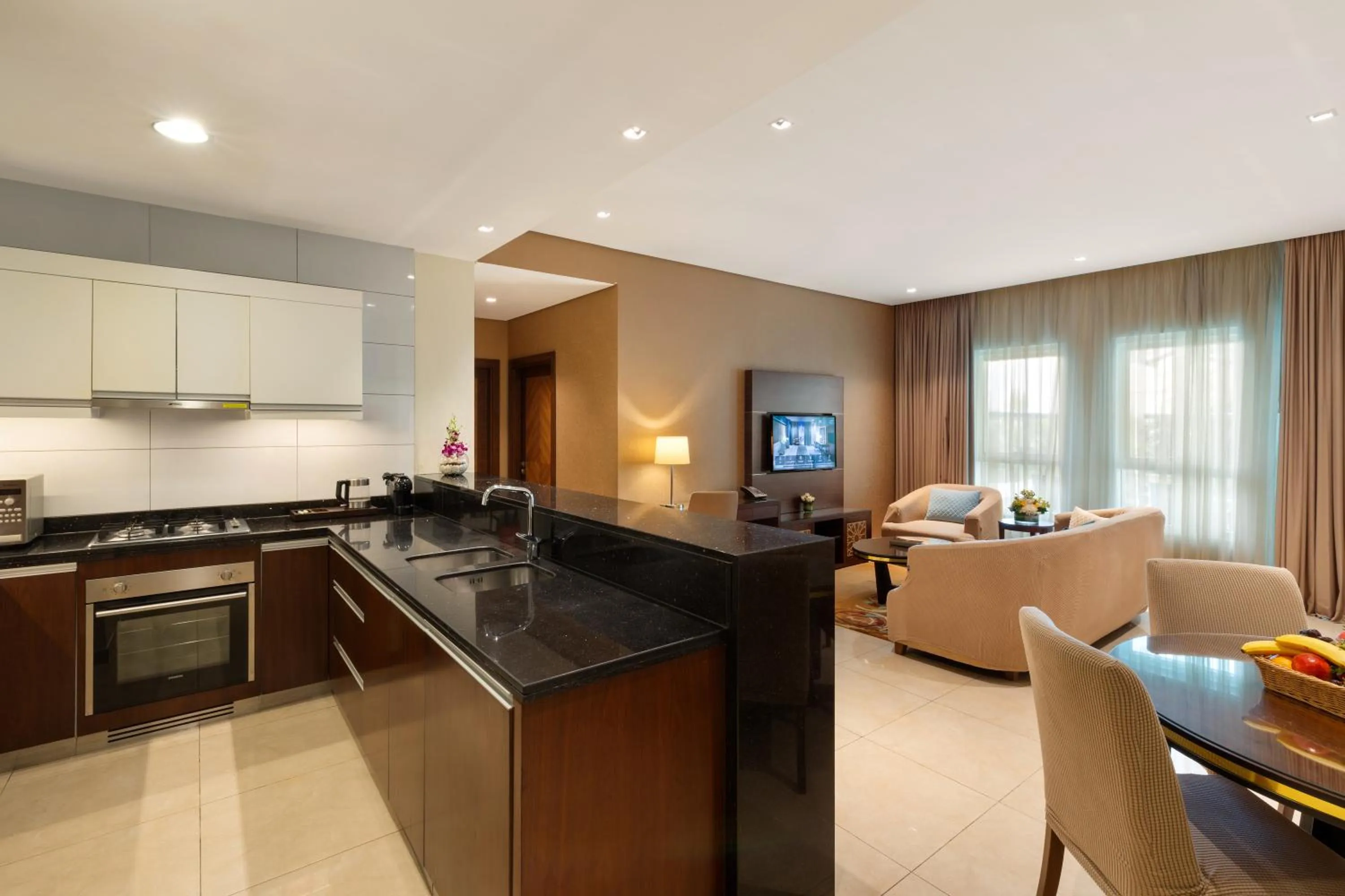 Kitchen or kitchenette in Royal Continental Suites Business Bay - Deluxe Apartments