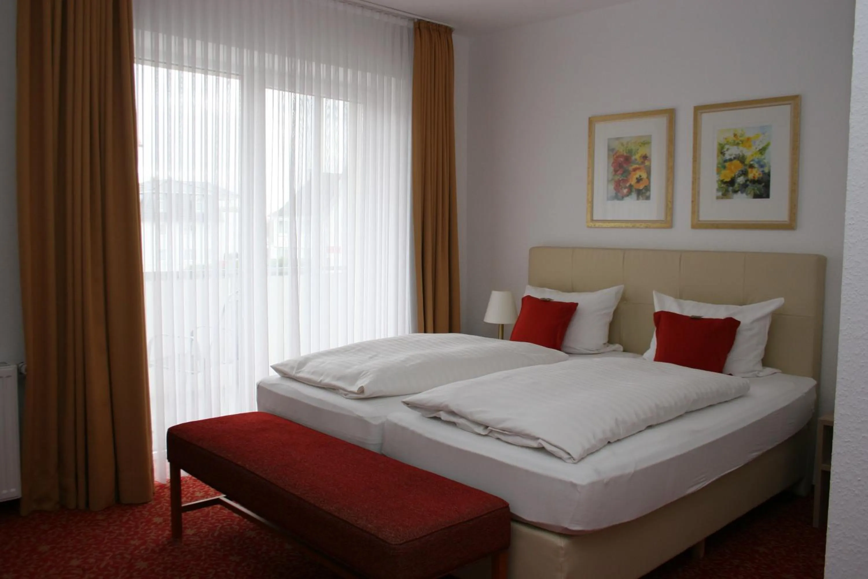 Bed in Hotel Petersen