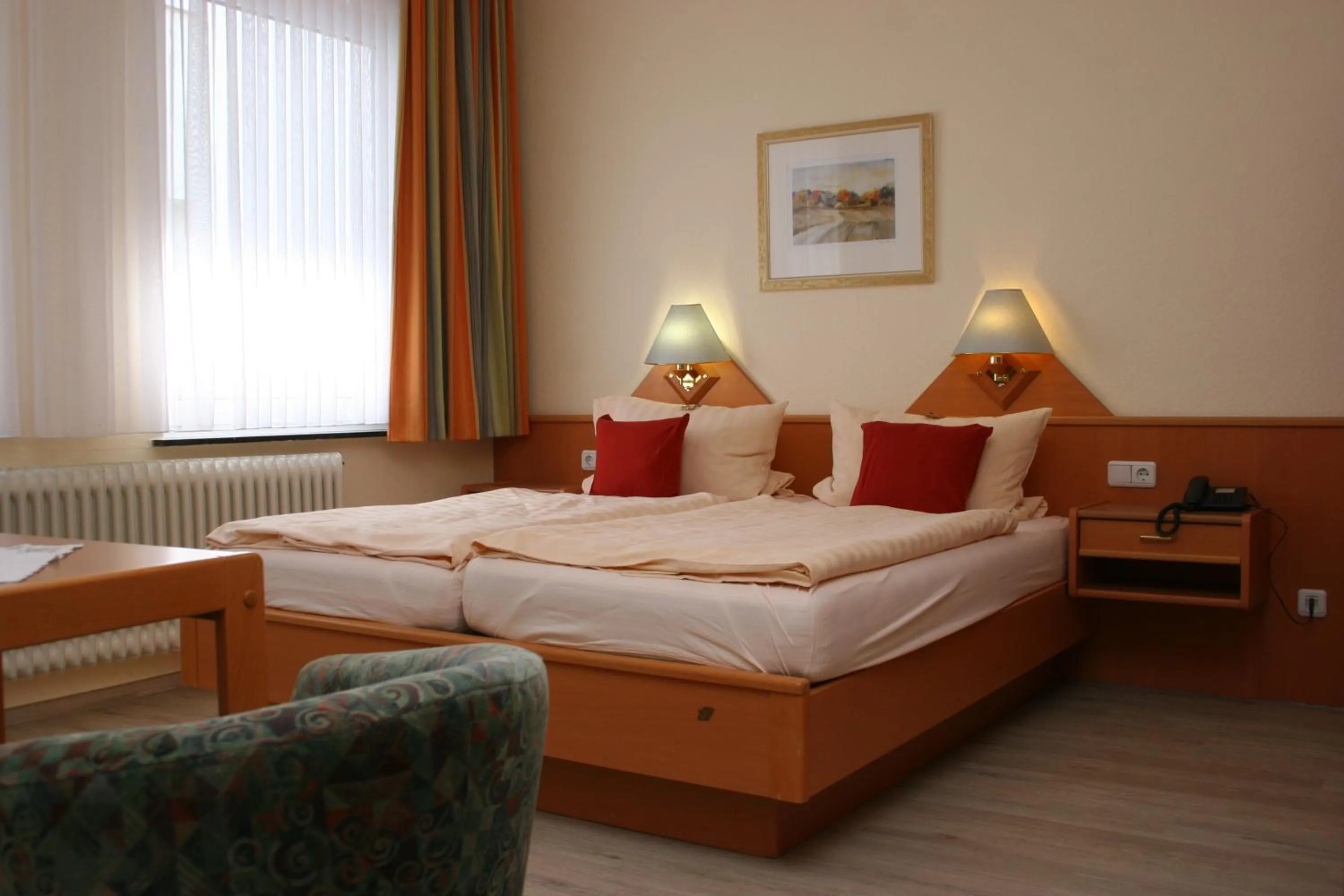 Bed in Hotel Petersen