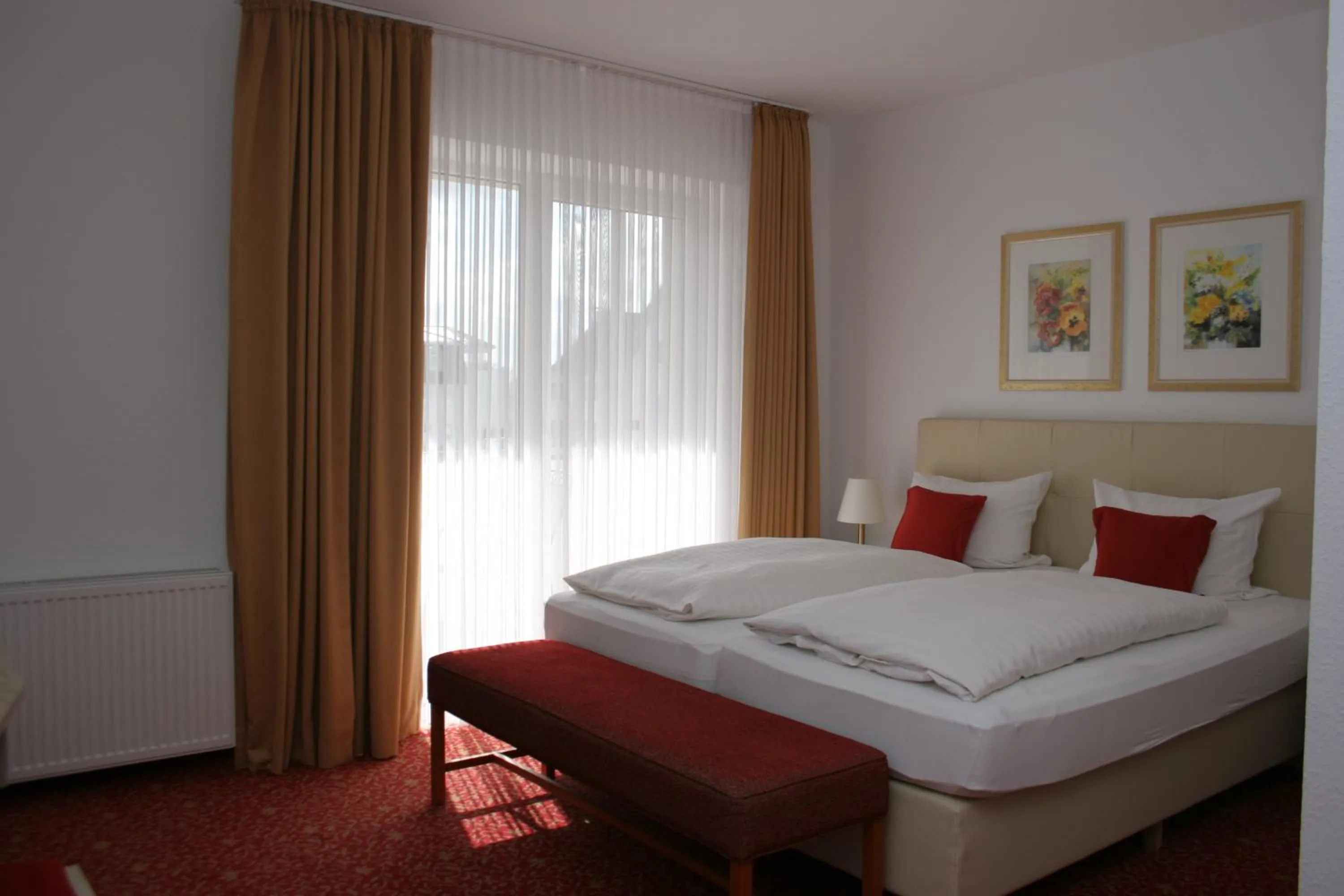 Bed in Hotel Petersen