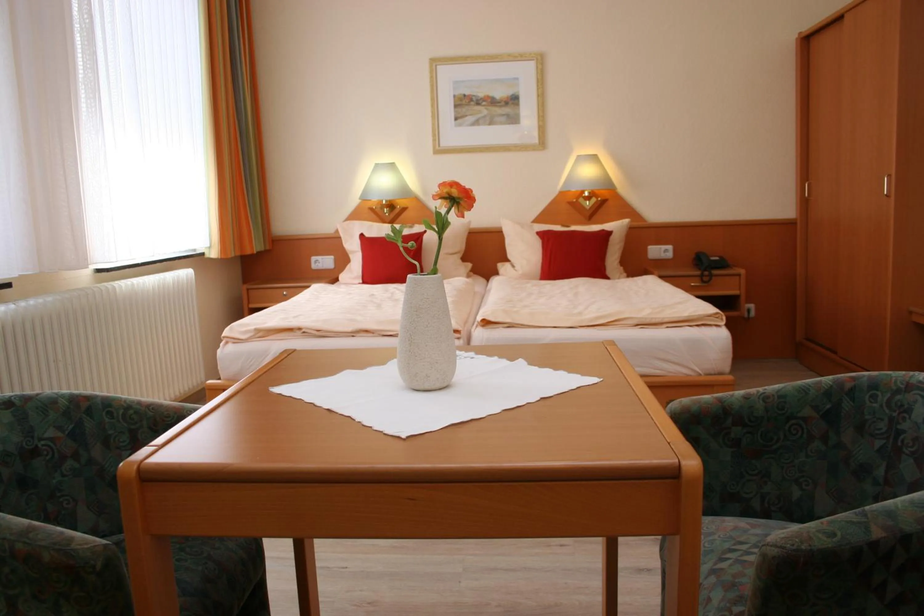 Bed in Hotel Petersen