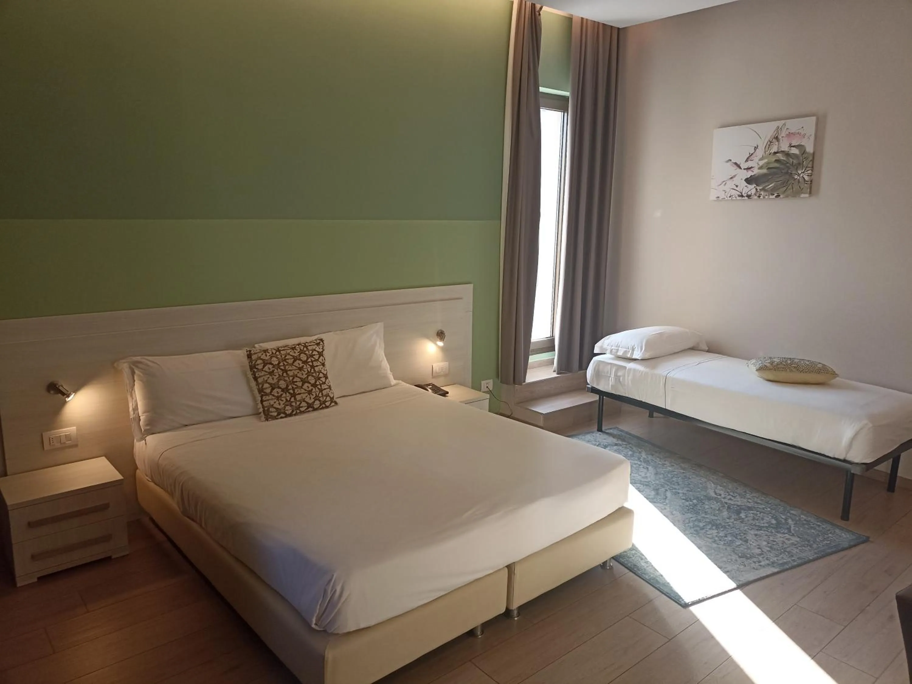 View (from property/room), Bed in Palazzo Marignano Hotel