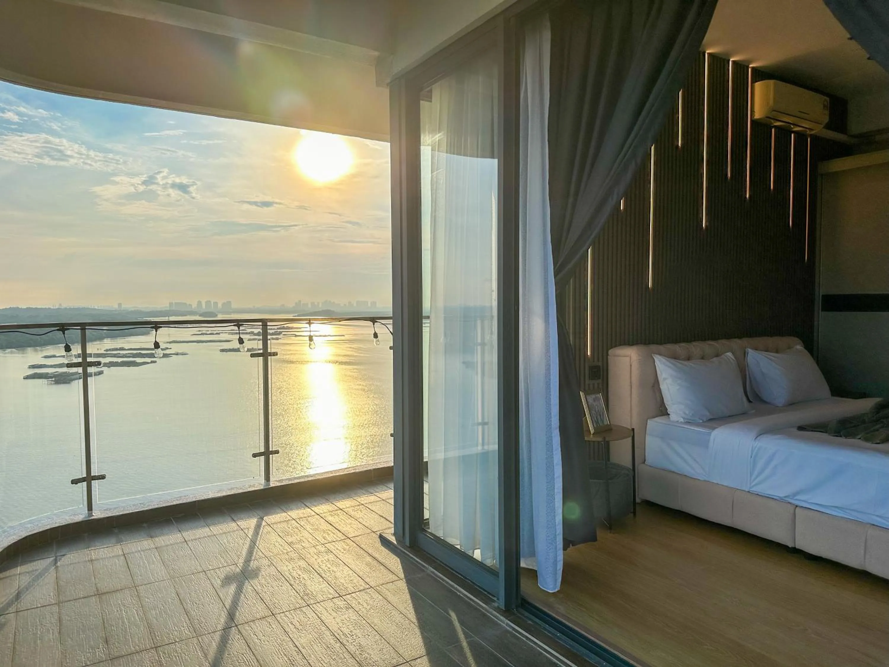 Balcony/Terrace, Bed in Country Garden Seaview Suite by Nest Home at Danga Bay