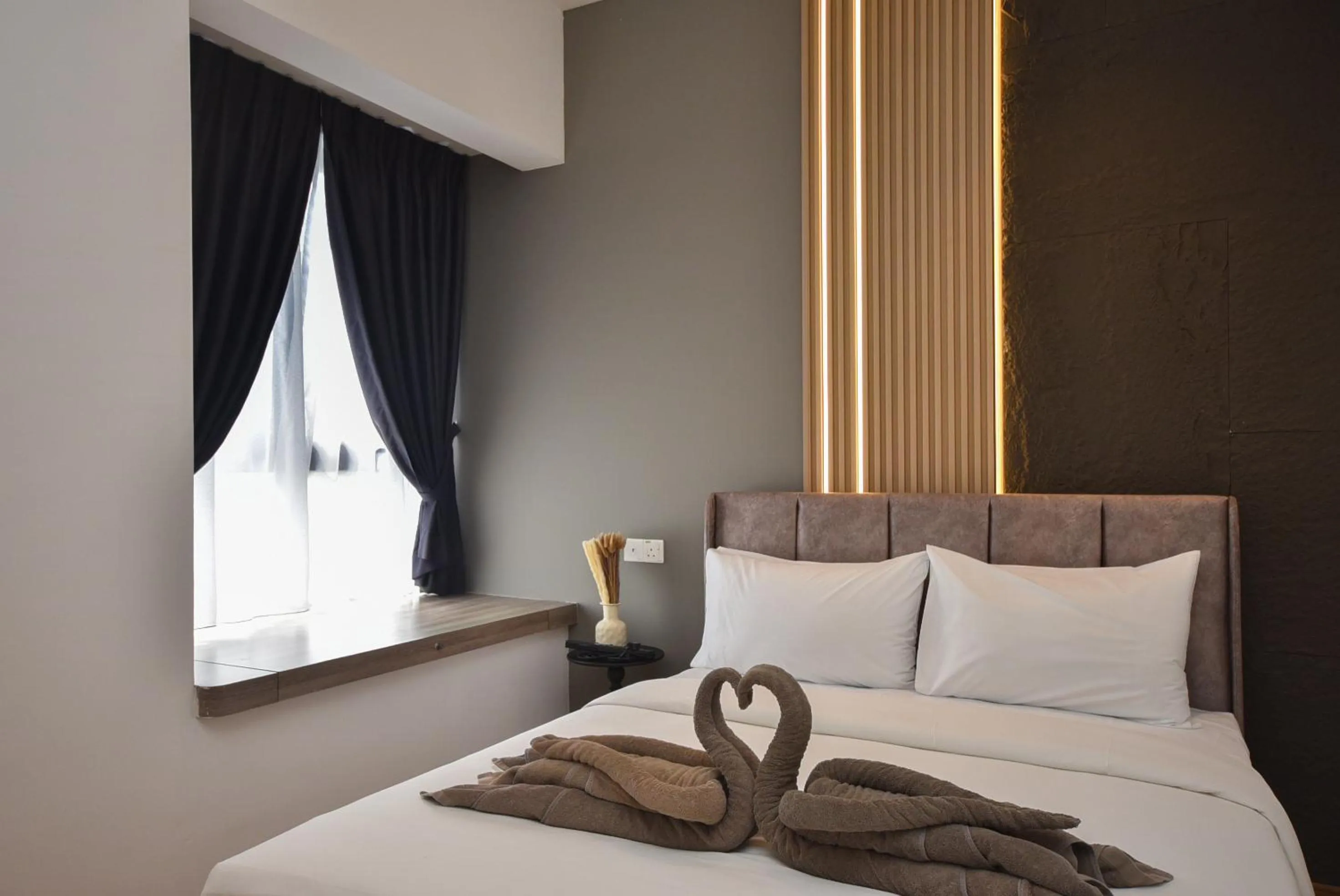 Bed in Country Garden Seaview Suite by Nest Home at Danga Bay