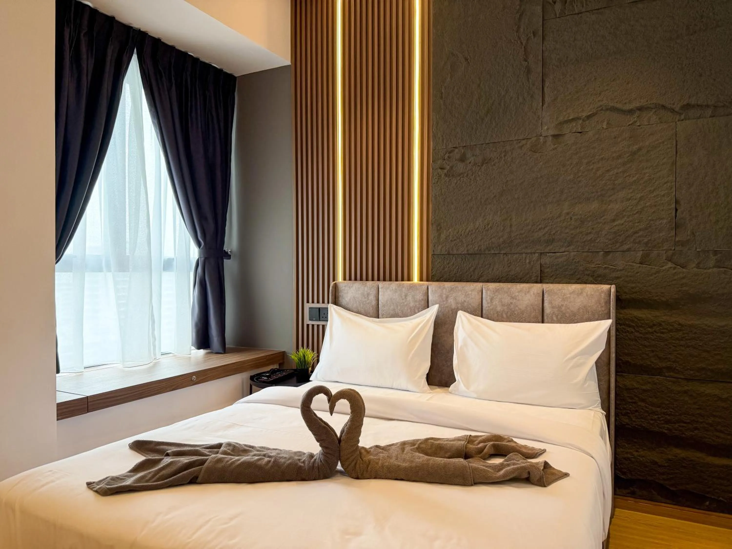 Bed in Country Garden Seaview Suite by Nest Home at Danga Bay