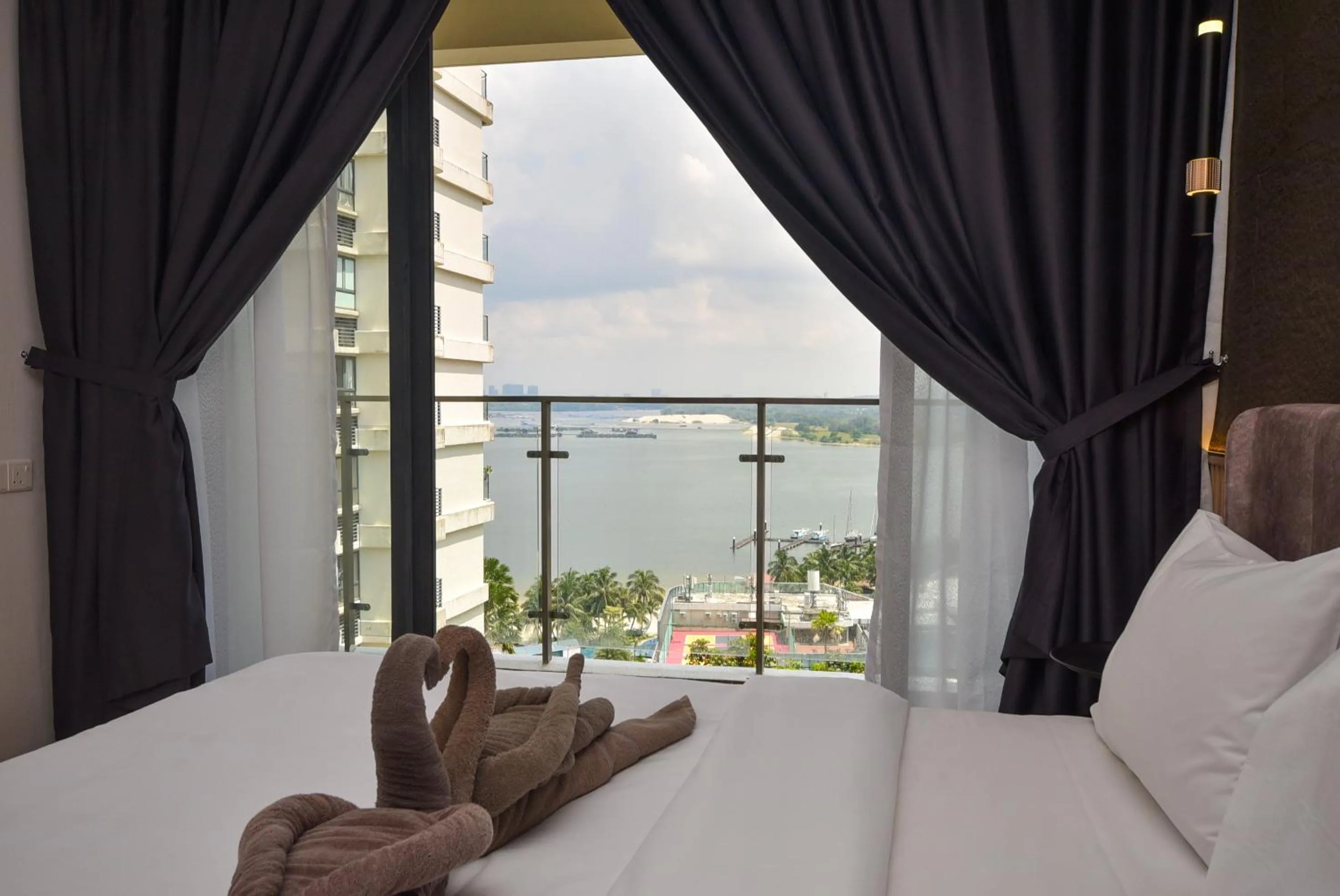 Bed in Country Garden Seaview Suite by Nest Home at Danga Bay