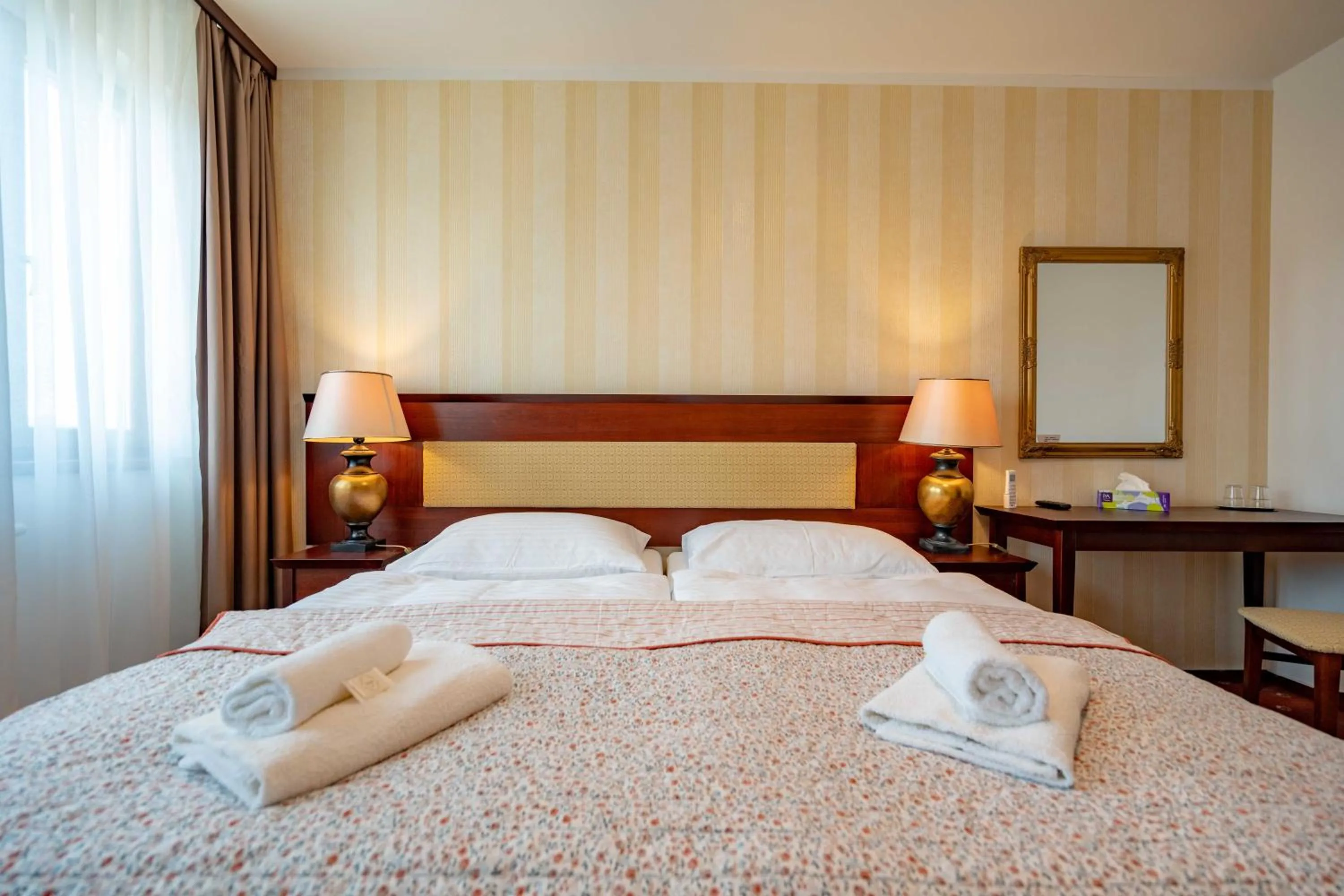 towels, Bed in Hotel Volf