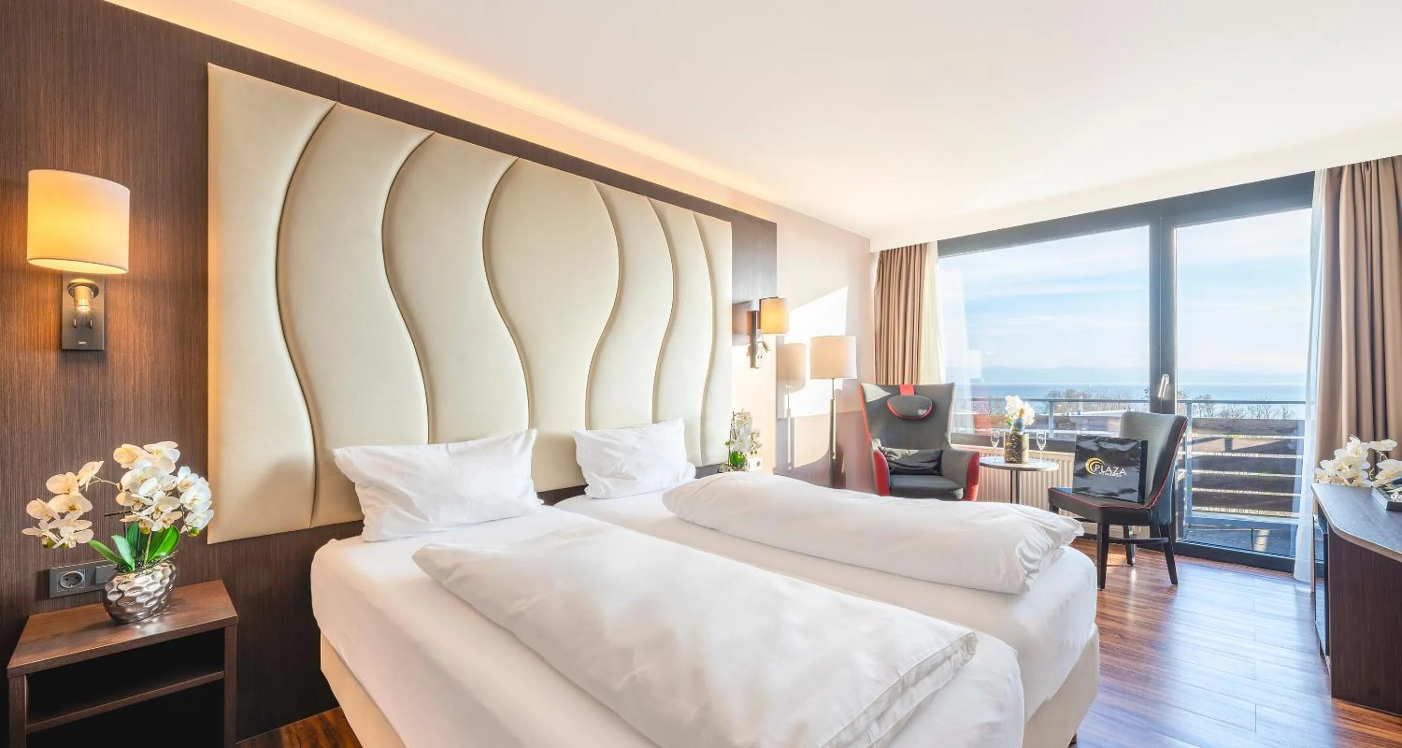 Photo of the whole room, Bed in PLAZA Hotel Föhr am Bodensee