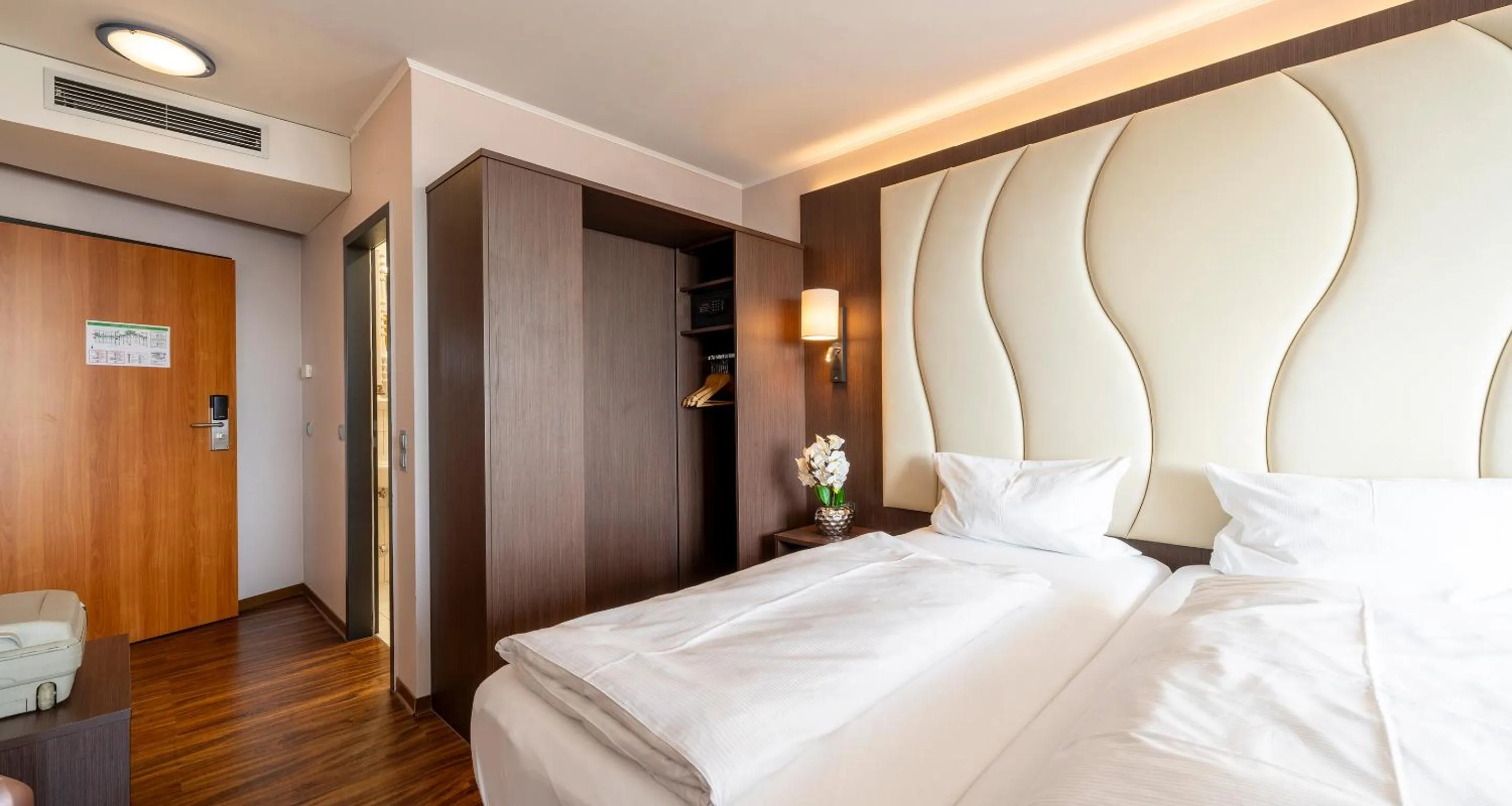 Bed in PLAZA Hotel Föhr am Bodensee