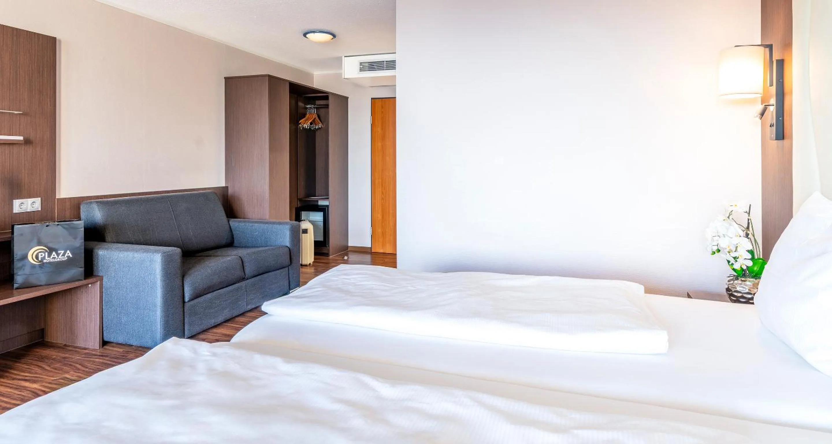 Bed in PLAZA Hotel Föhr am Bodensee