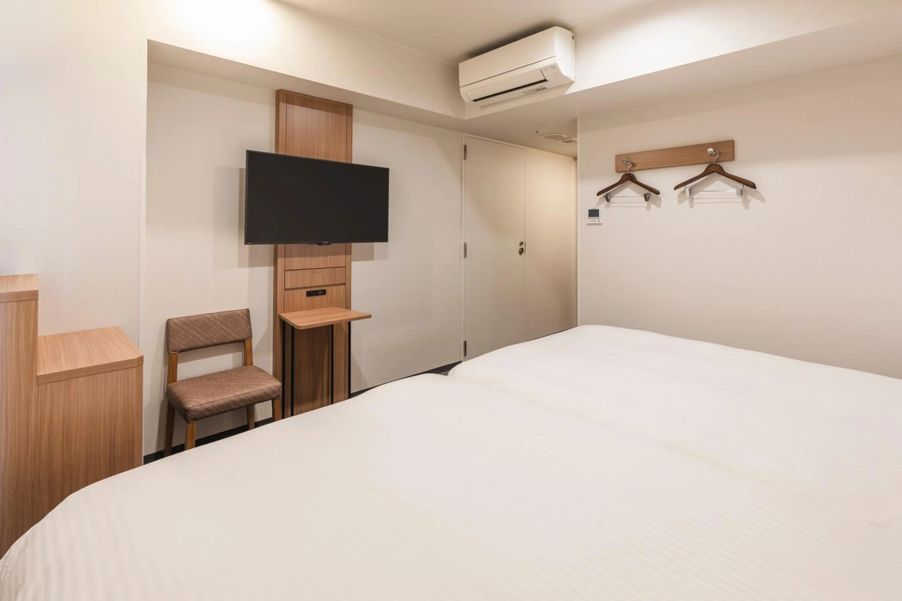 Bed in Sotetsu Fresa Inn Yokohama Higashiguchi