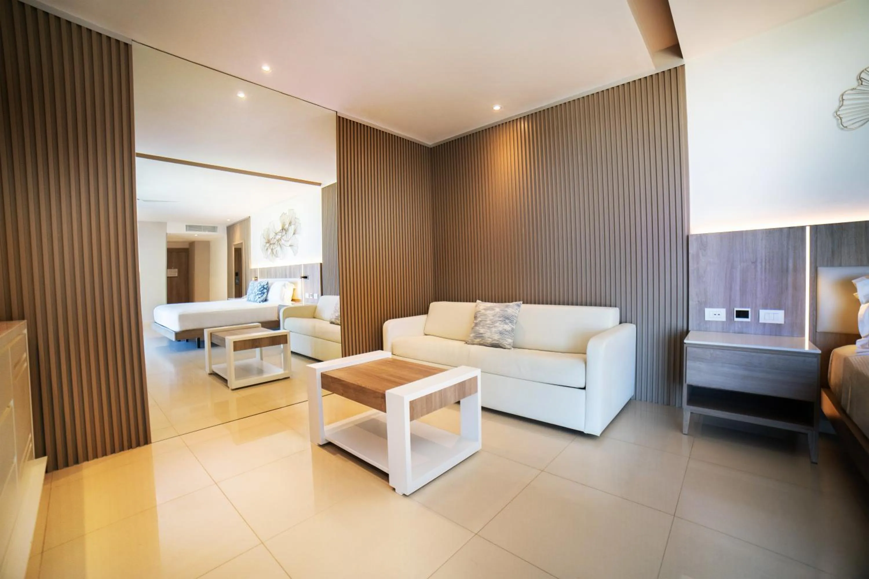 Living room, Bed in Royalton Punta Cana, An Autograph Collection All-Inclusive Resort & Casino