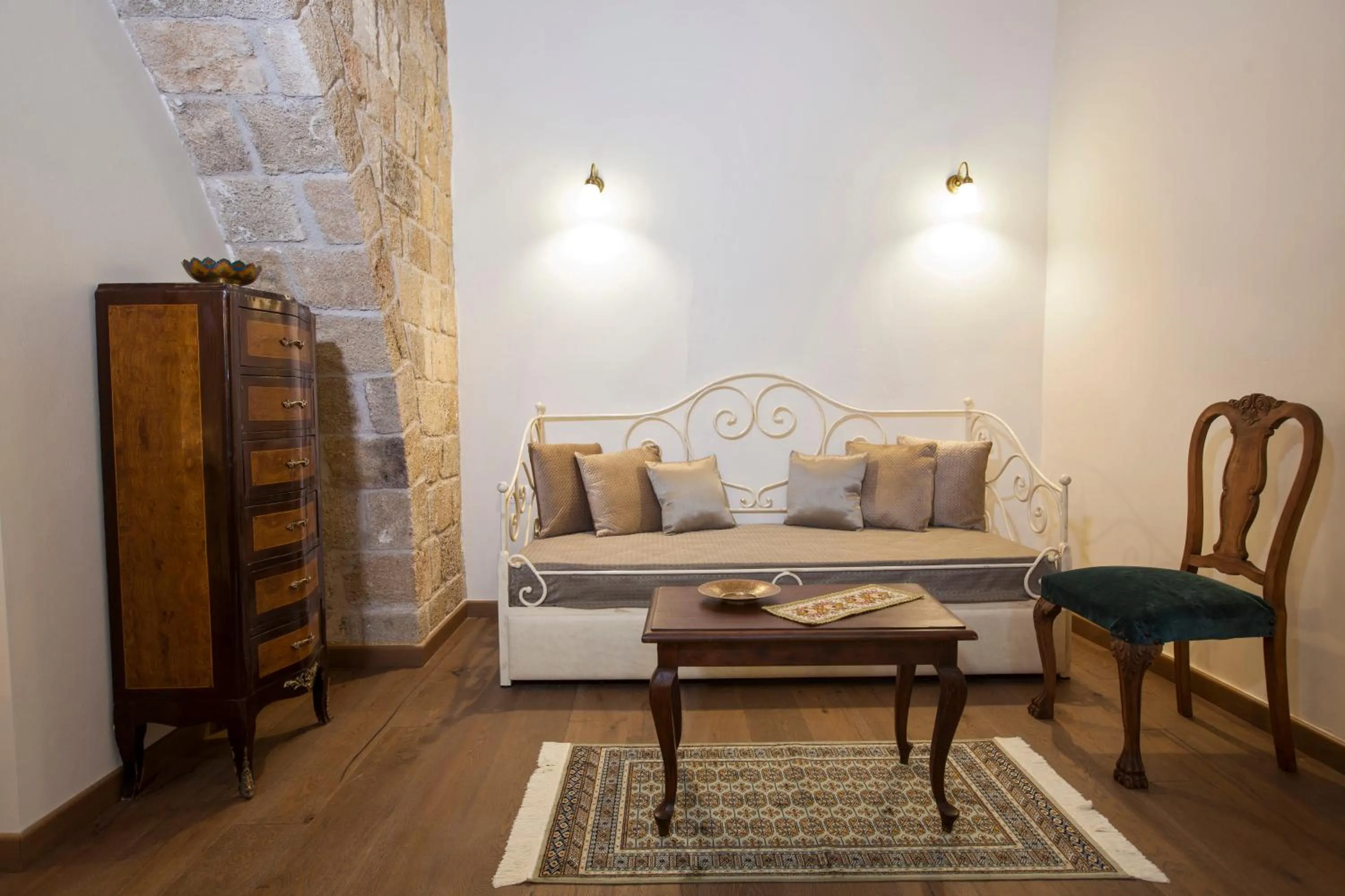 Living room, Bed in Porolithos Boutique Hotel