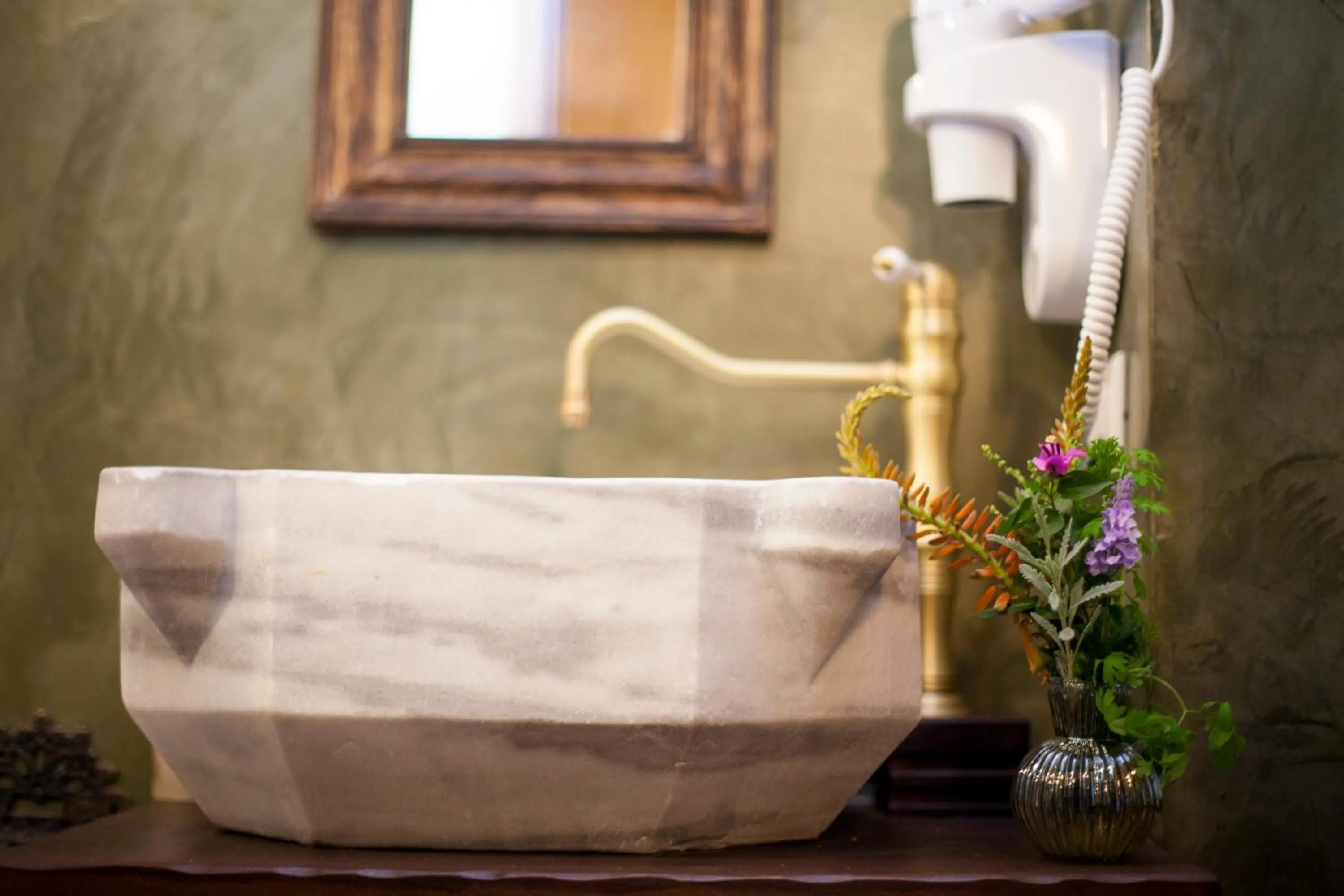 Bathroom in Porolithos Boutique Hotel