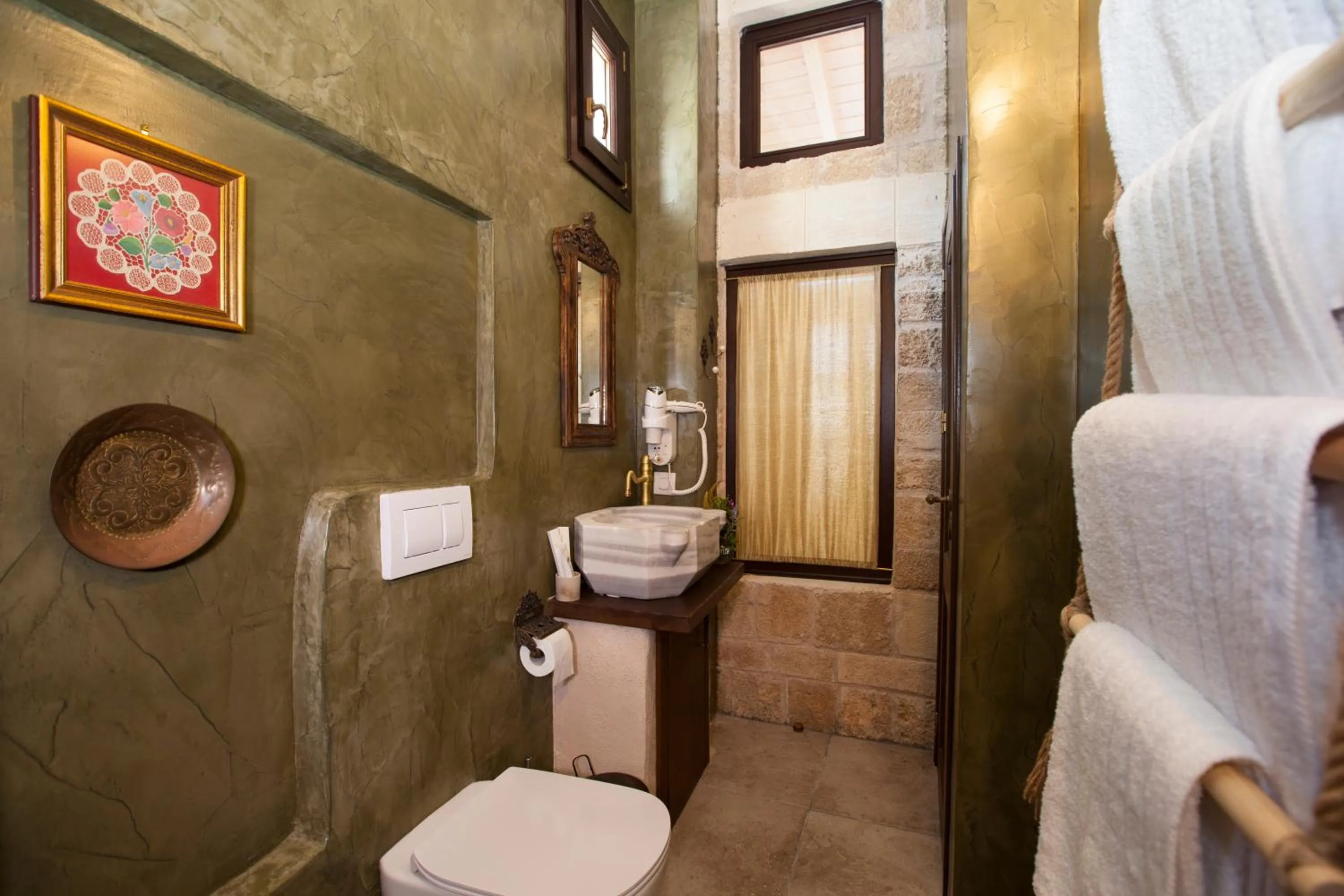 Bathroom in Porolithos Boutique Hotel