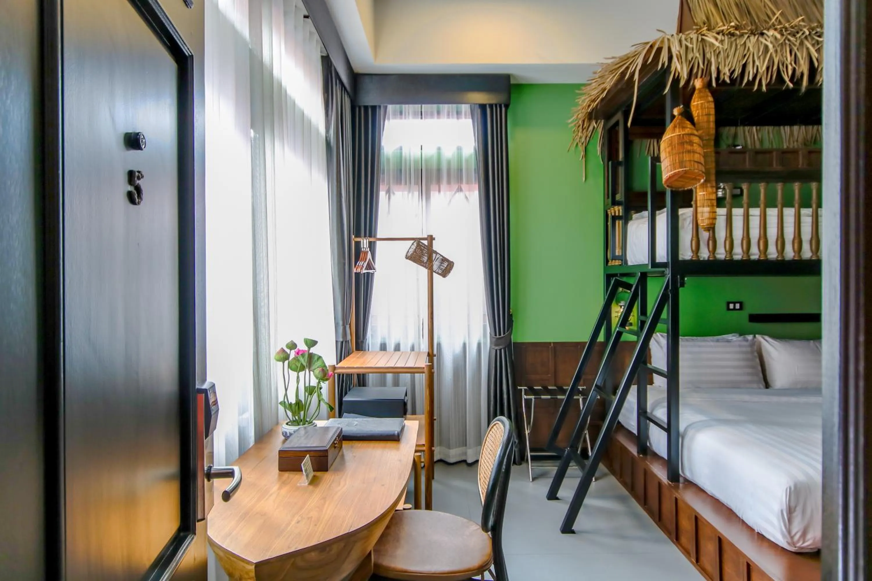 Bed in DE Phanakron Boutique Hotel