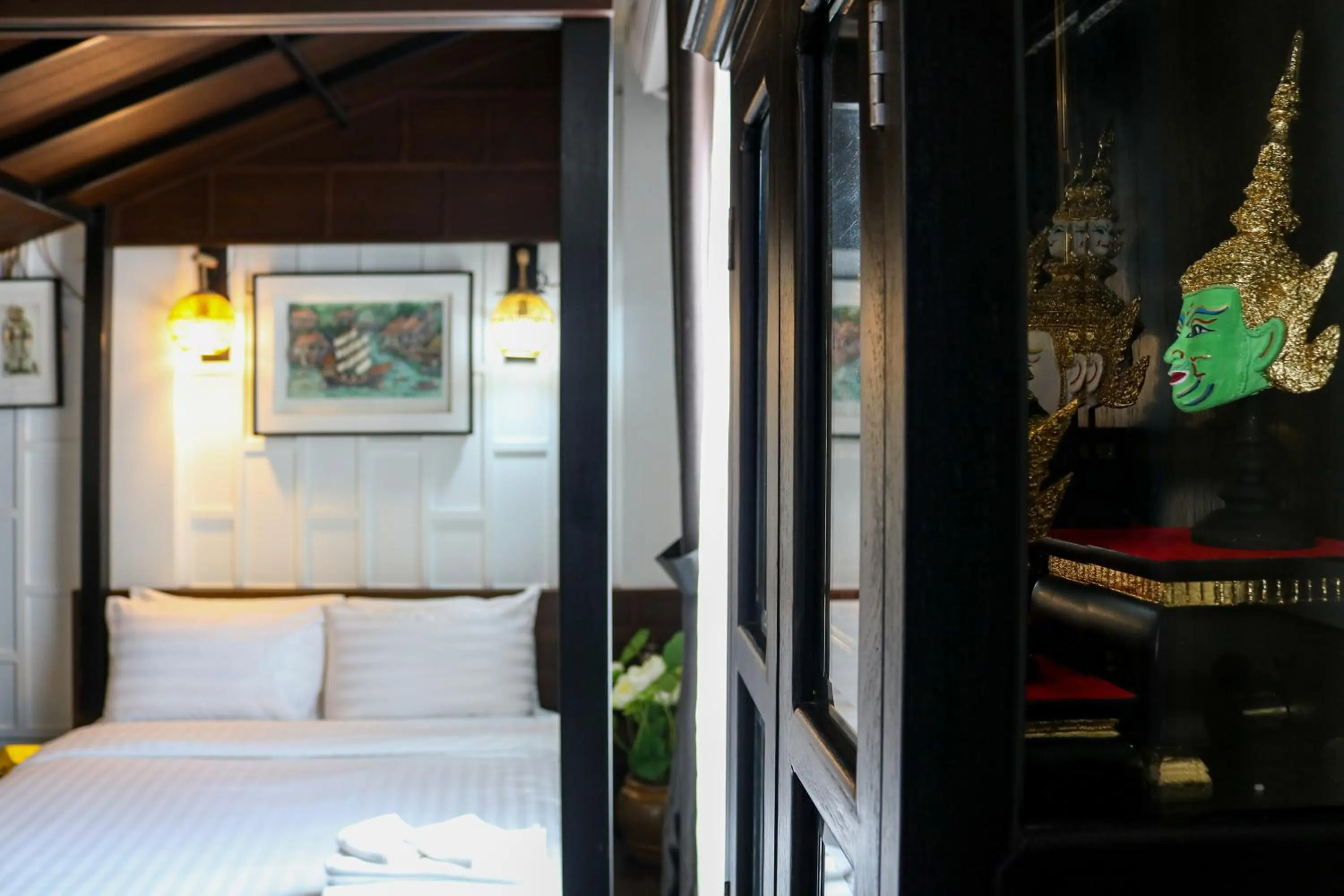 Decorative detail, Bed in DE Phanakron Boutique Hotel