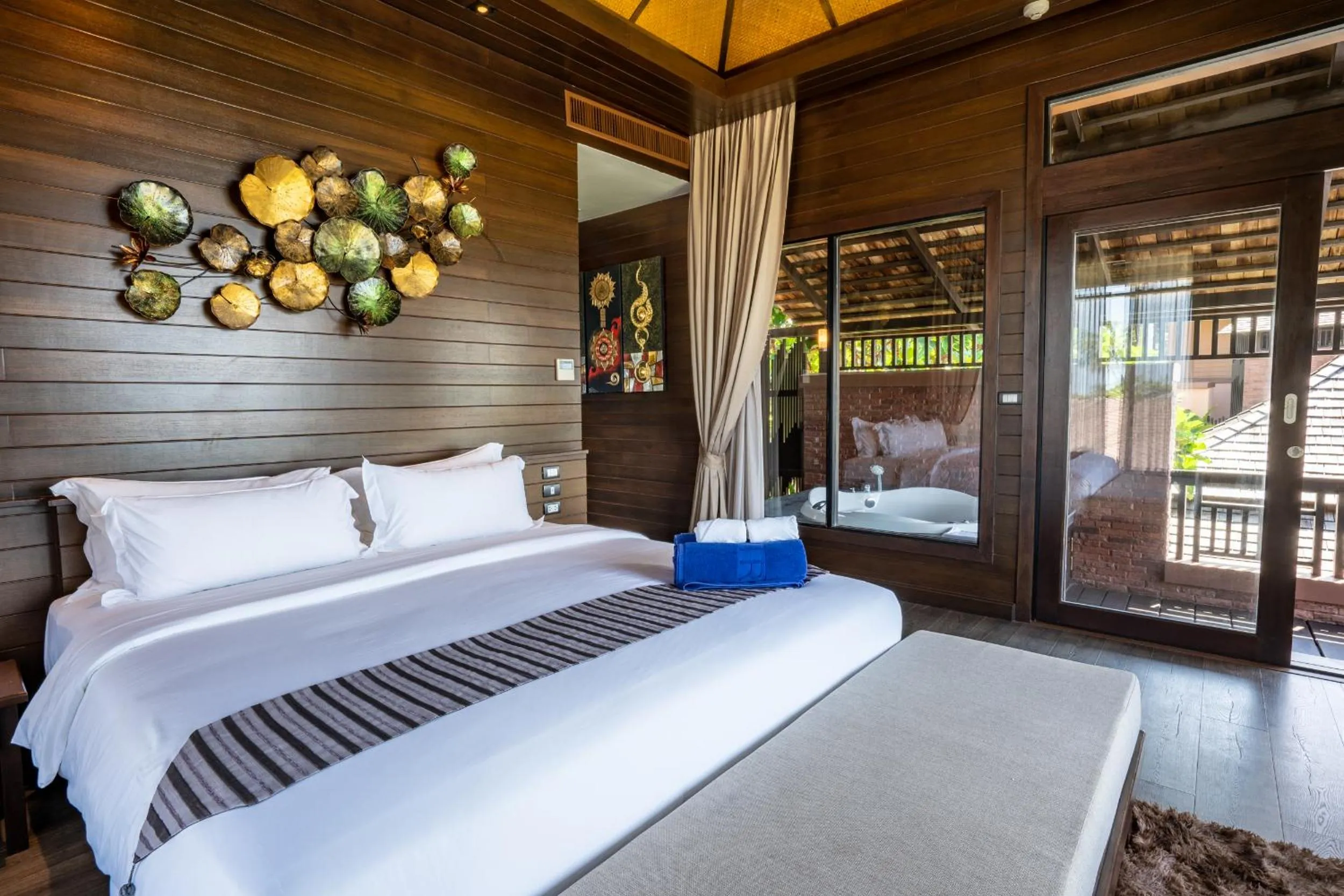 Bed in Nirvana Beach Resort, Koh Lanta SHA Extra Plus