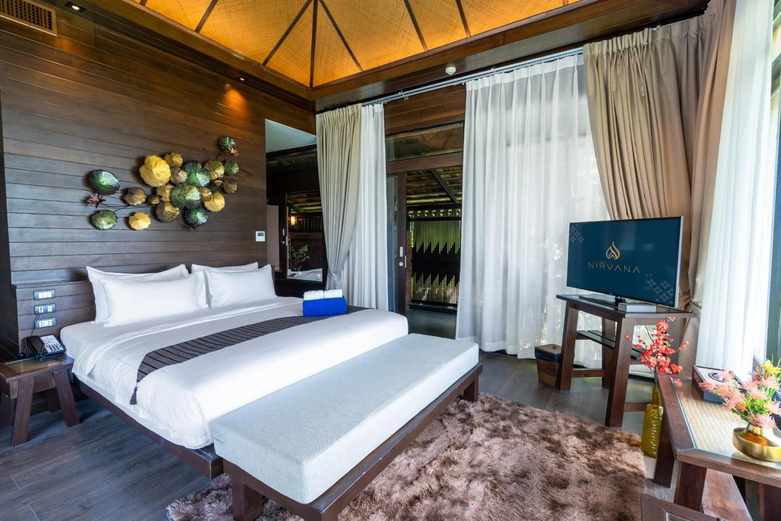 Bed in Nirvana Beach Resort, Koh Lanta SHA Extra Plus