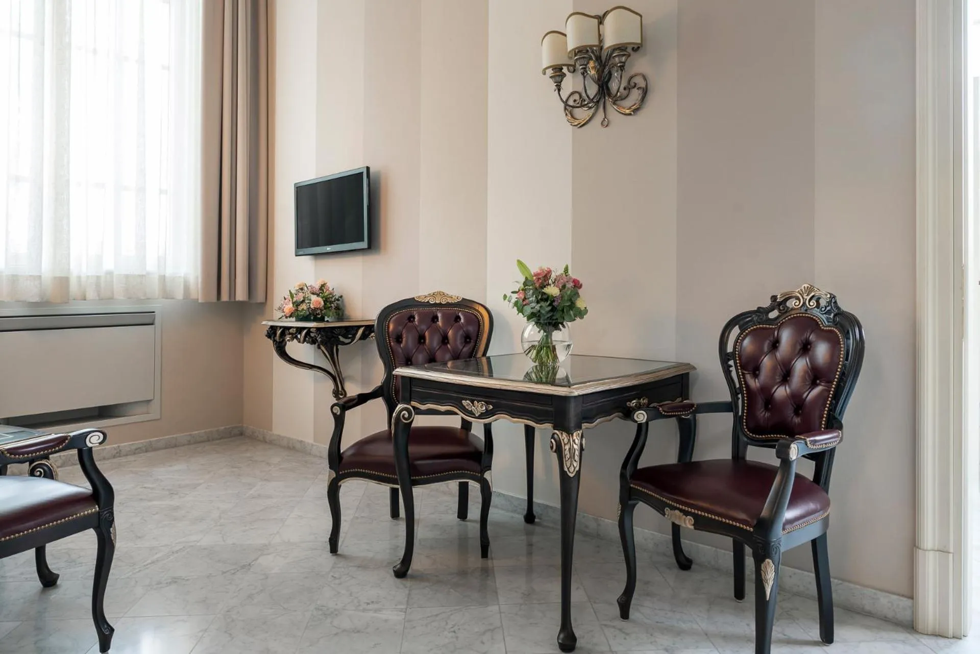 Seating area in Grand Hotel di Parma - UNA Esperienze