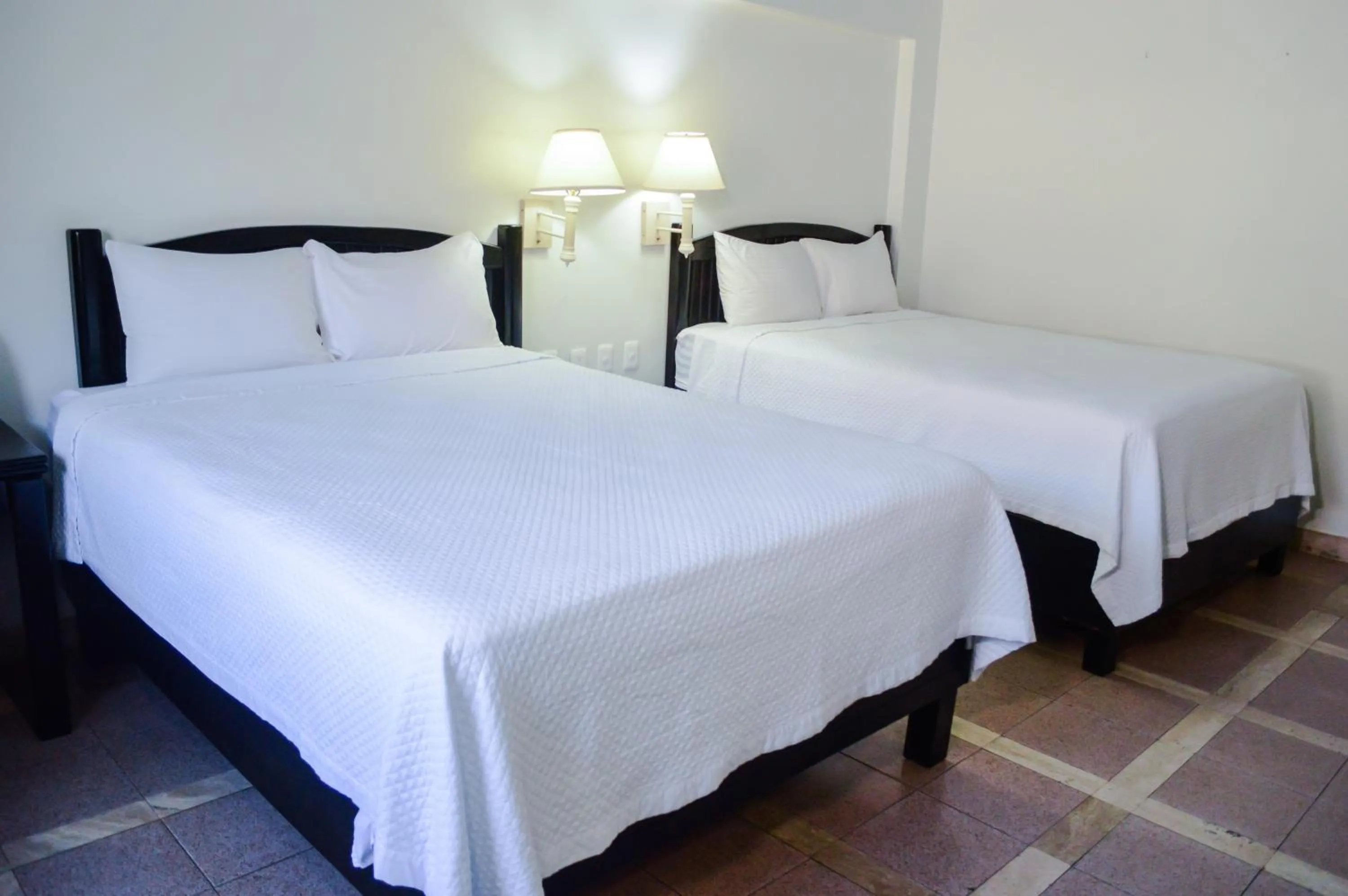 Bed in Gamma Guaymas Armida Hotel