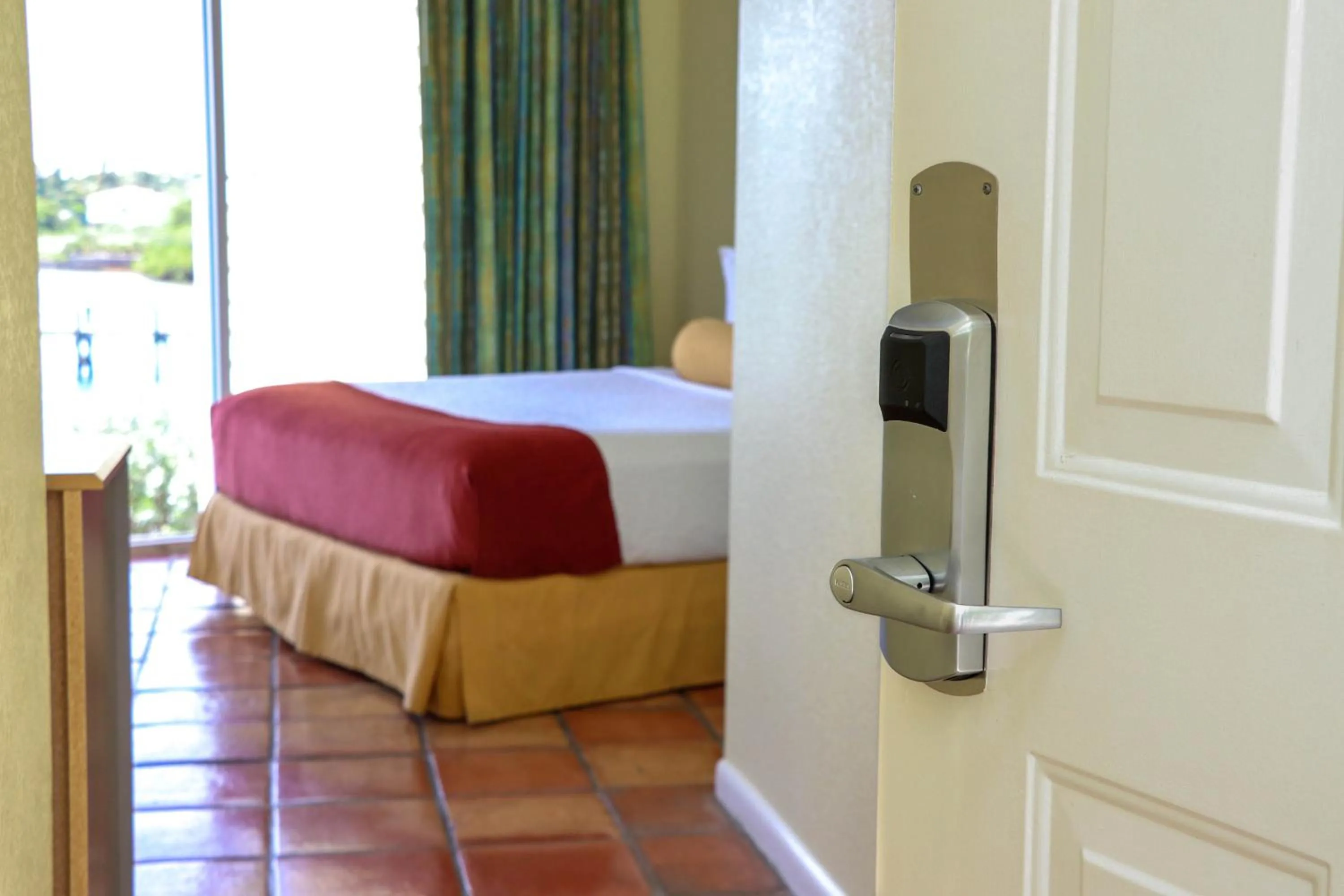 Bed in Jupiter Waterfront Inn