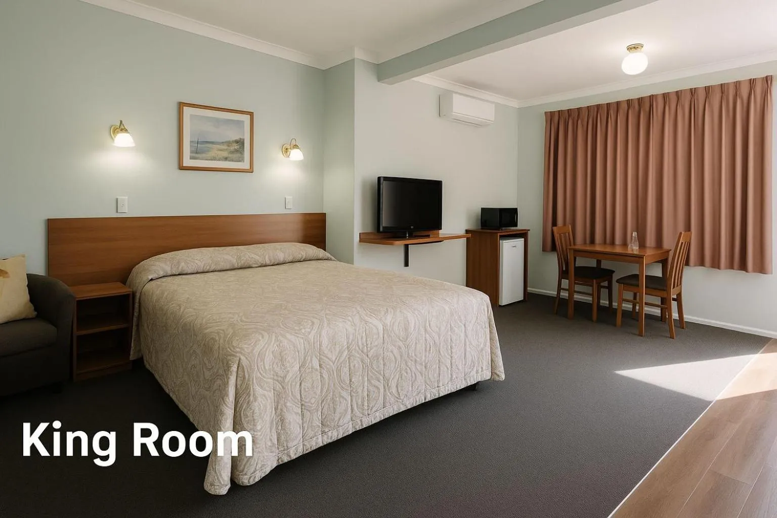 Bed in Colonial Motor Lodge Scone