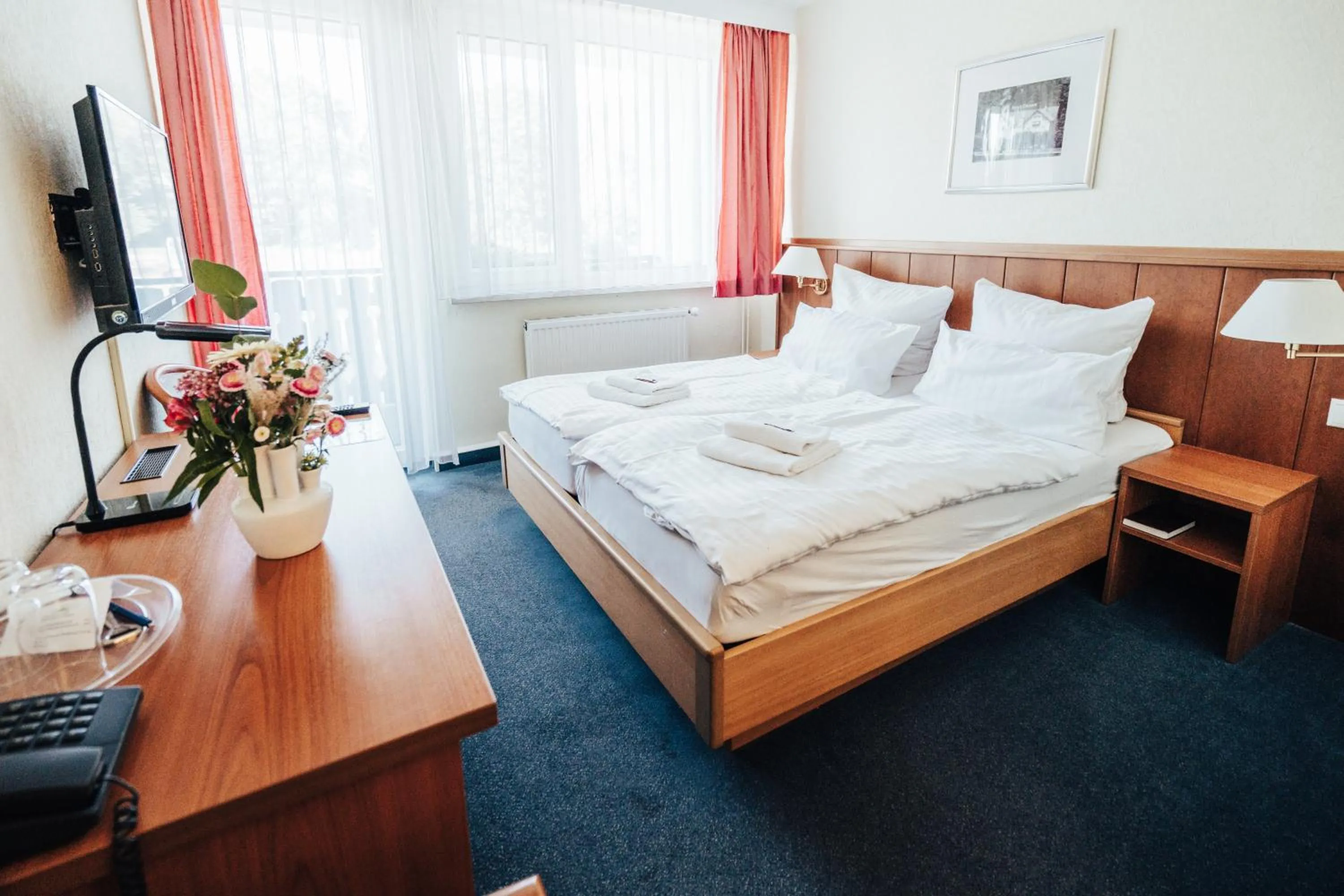 Photo of the whole room, Bed in Hotel Am Schlossberg