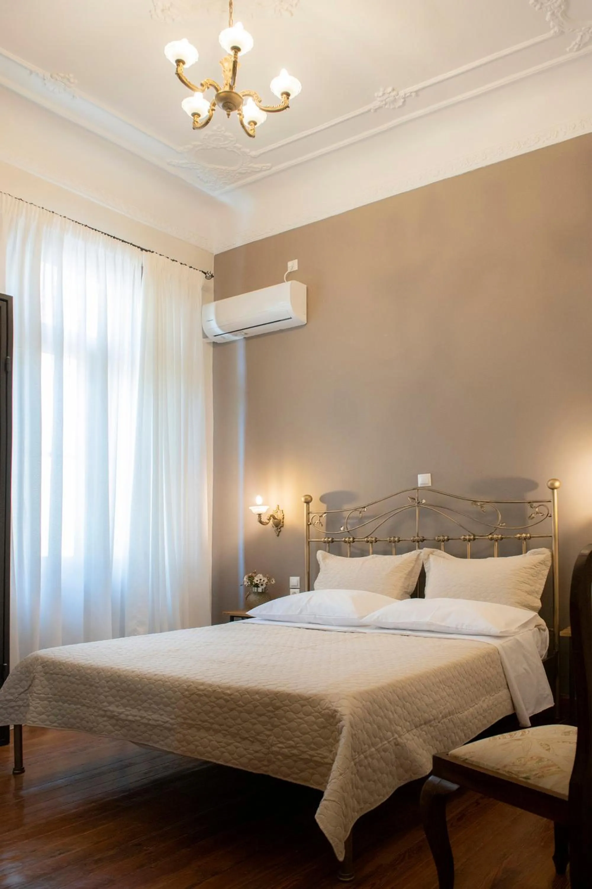 Bed in Beautiful City Suites