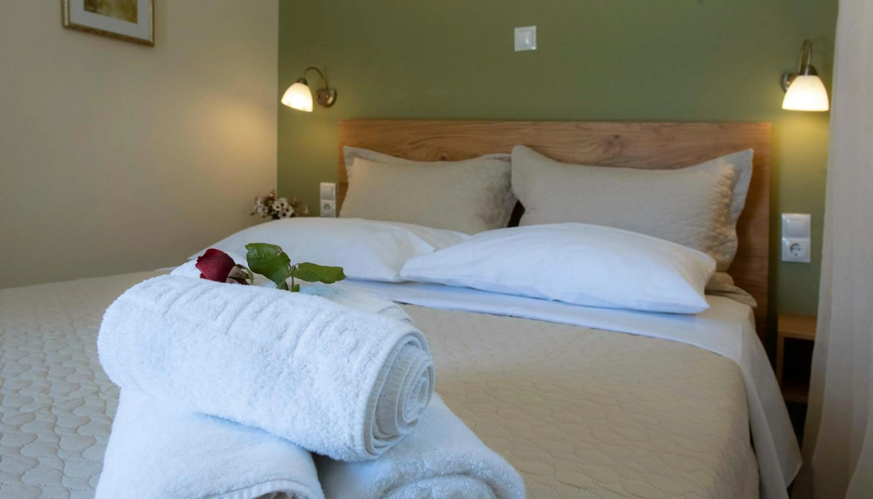 Bed in Beautiful City Suites