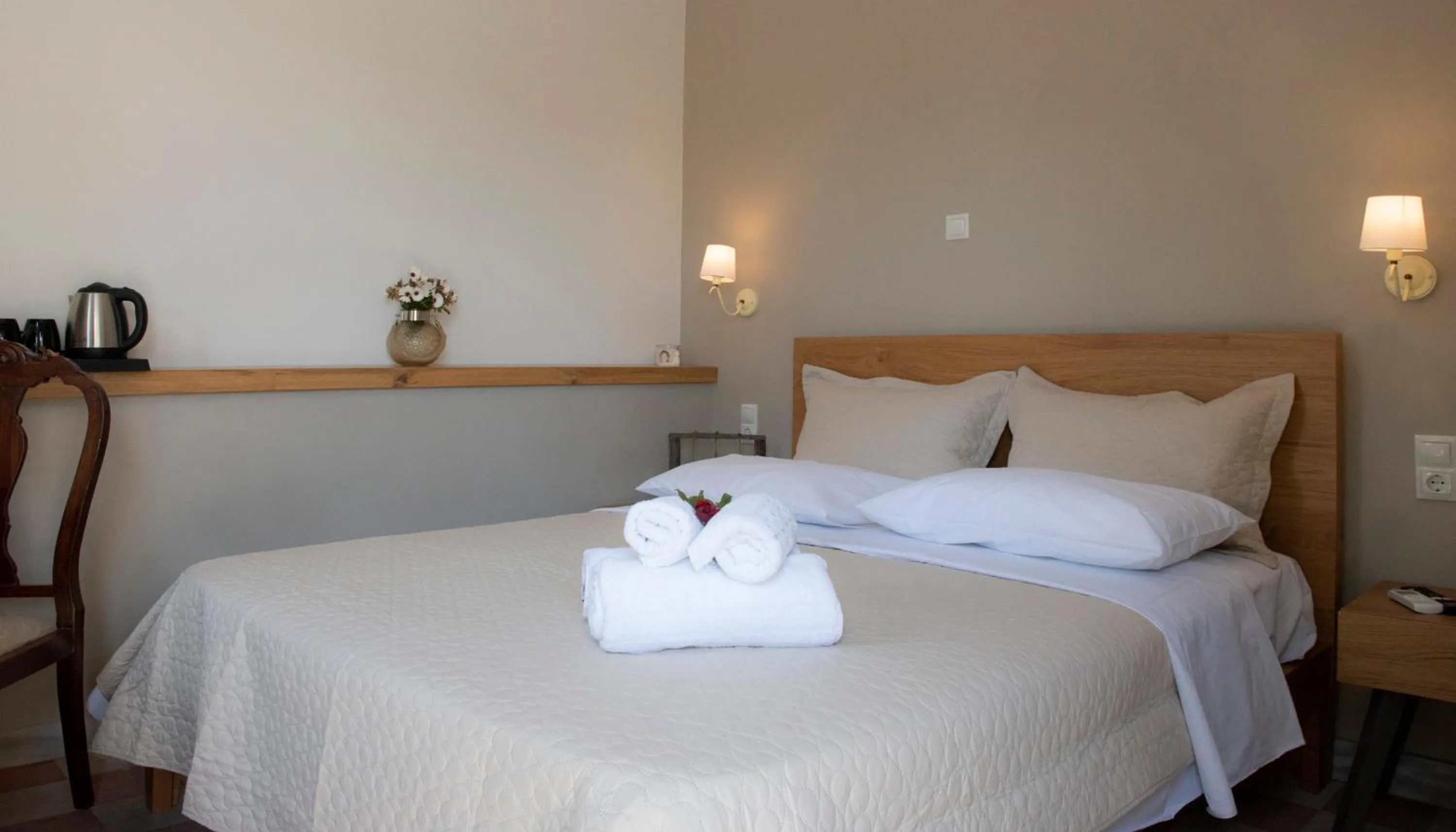 Bed in Beautiful City Suites