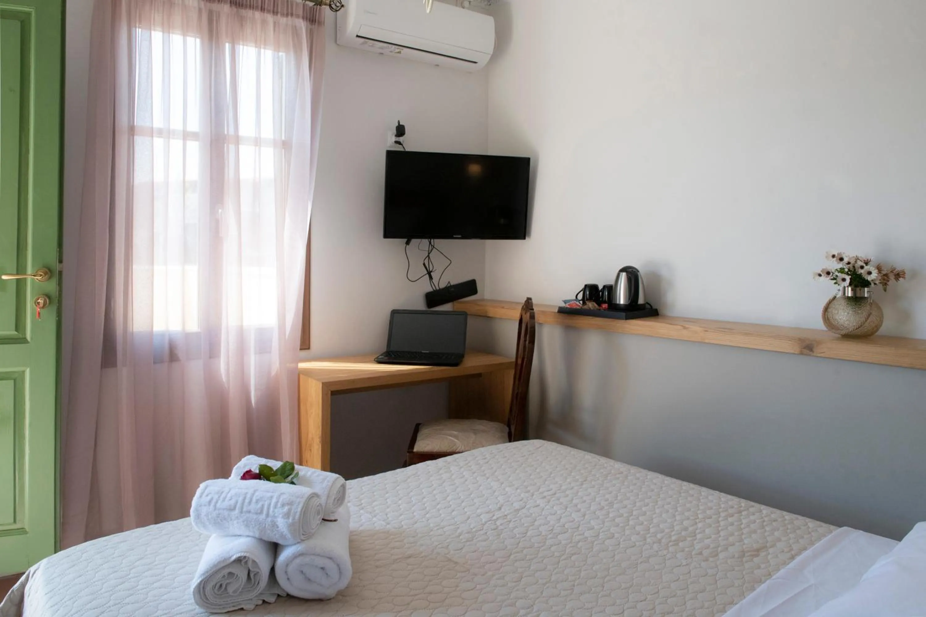 Bed in Beautiful City Suites