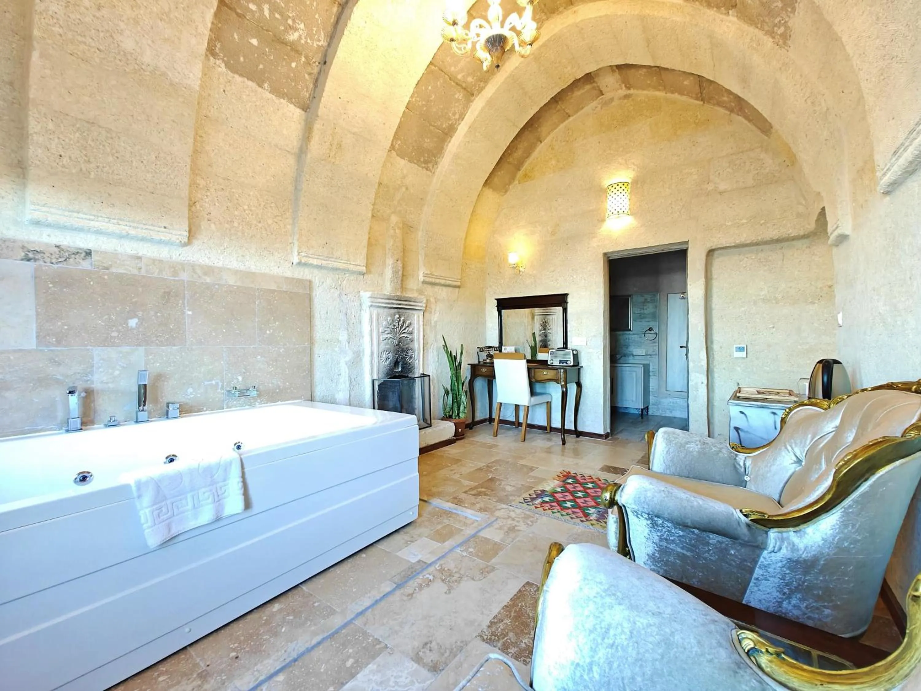 Seating area, Bed in Karlık Cave Suite Cappadocia