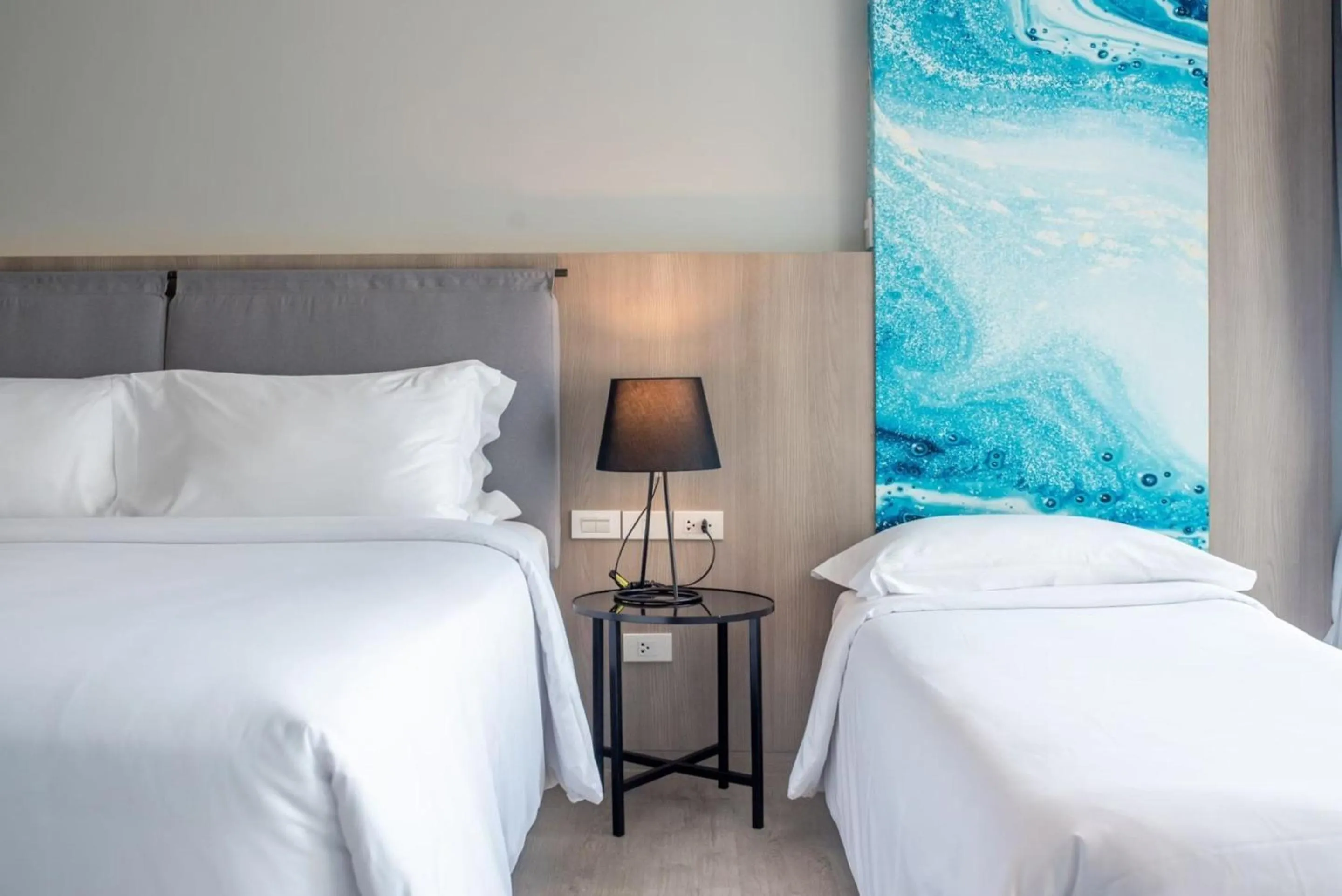 Bed in Fortune Saeng Chan Beach Hotel Rayong - SHA Plus