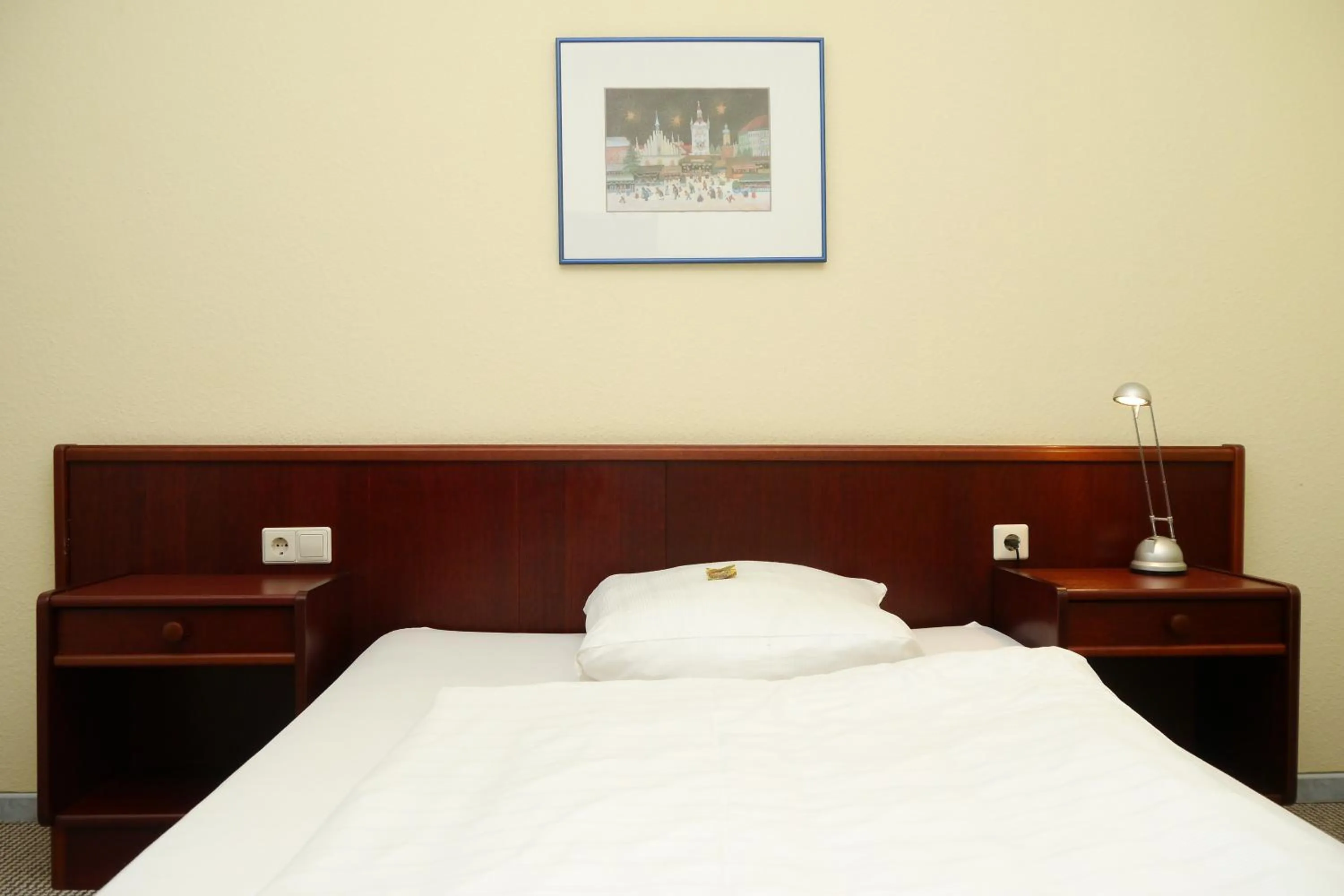 Bed in Erbenholz Hotel