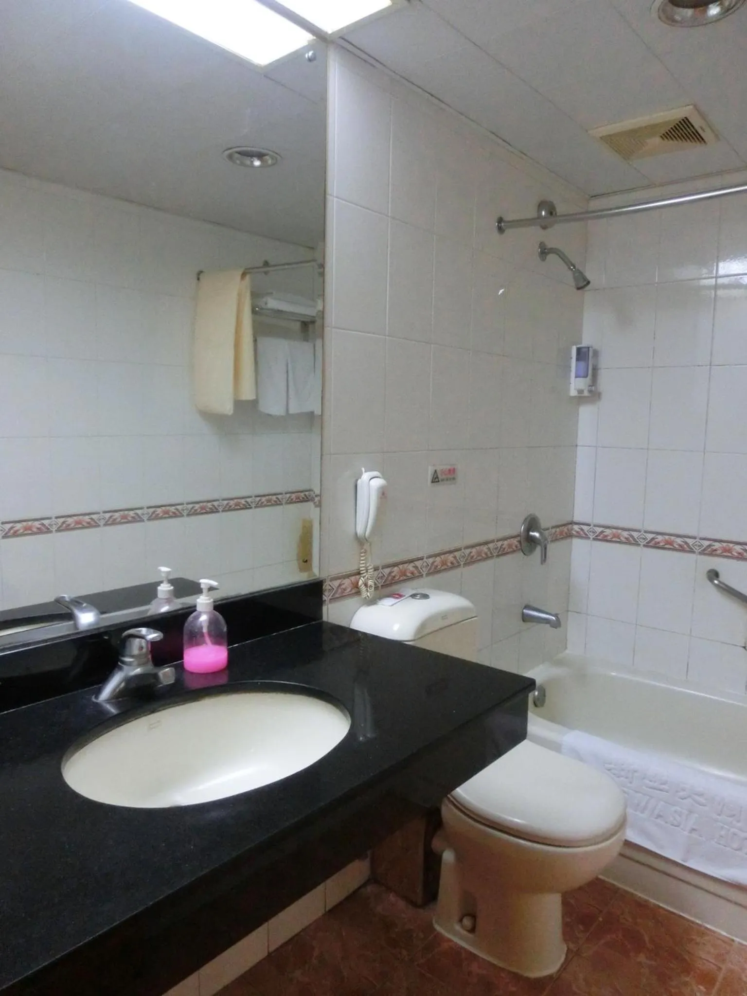 Toilet in New Asia Hotel