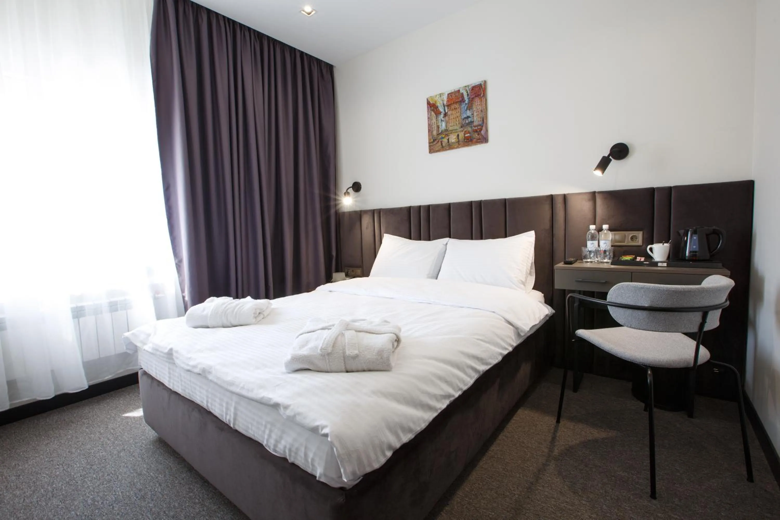 Bed in Kulikovskiy hotel