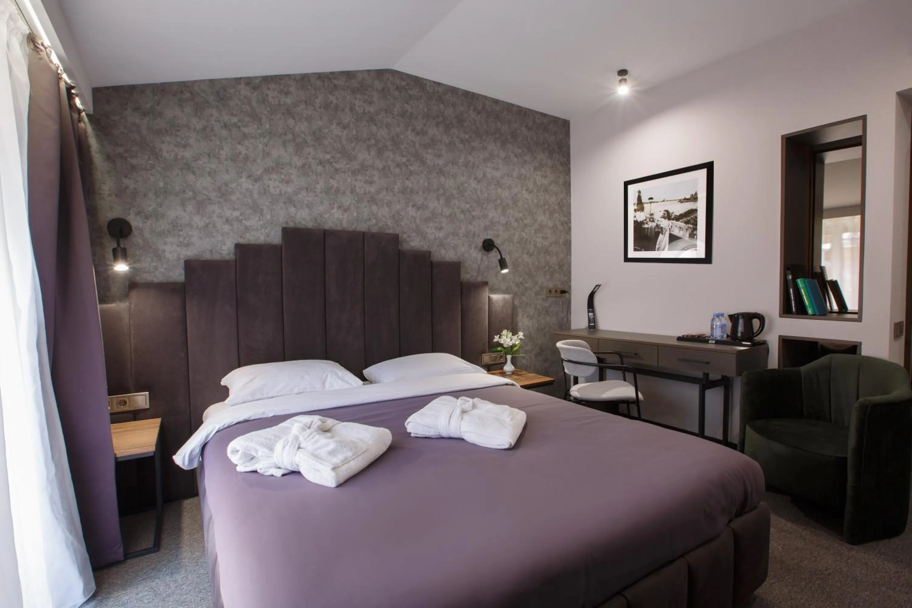 Bed in Kulikovskiy hotel