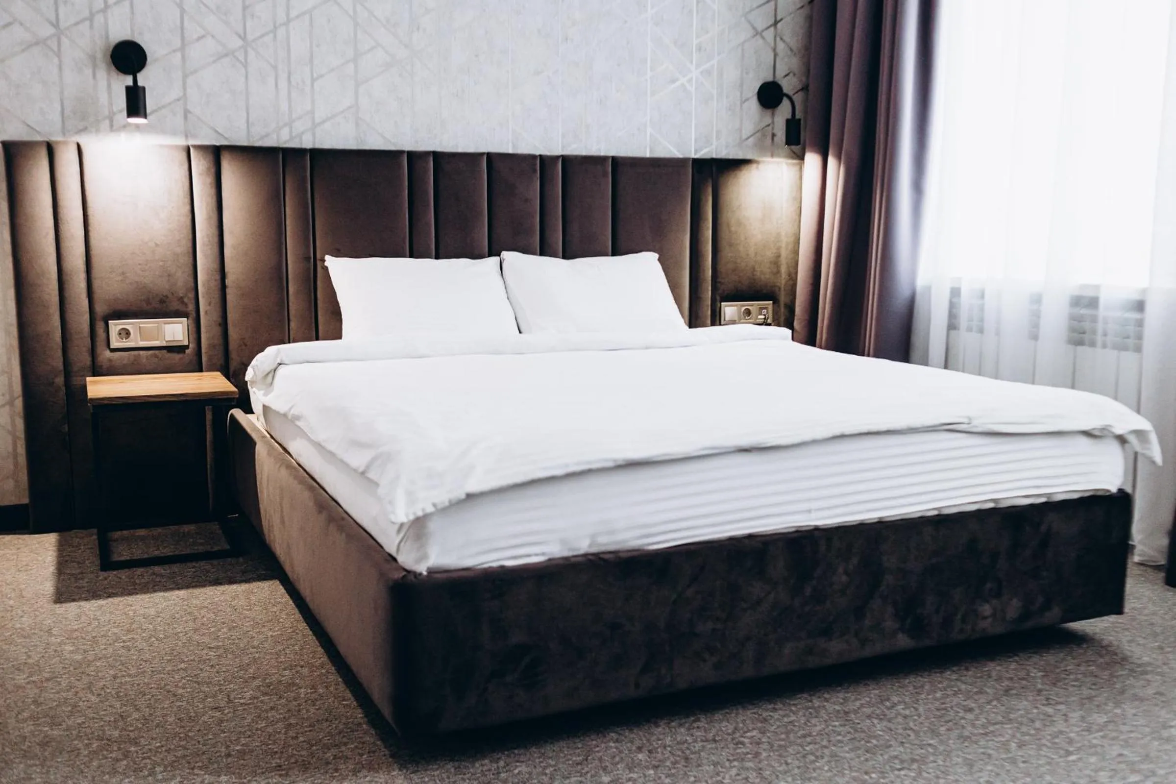 Bed in Kulikovskiy hotel
