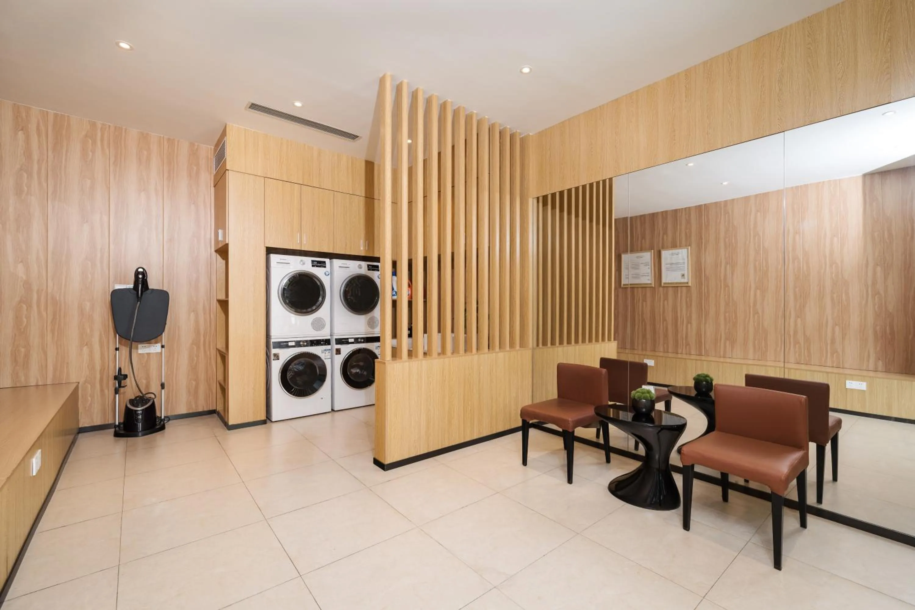 washing machine in Paco Hotel Tаojin Metro Guangzhou