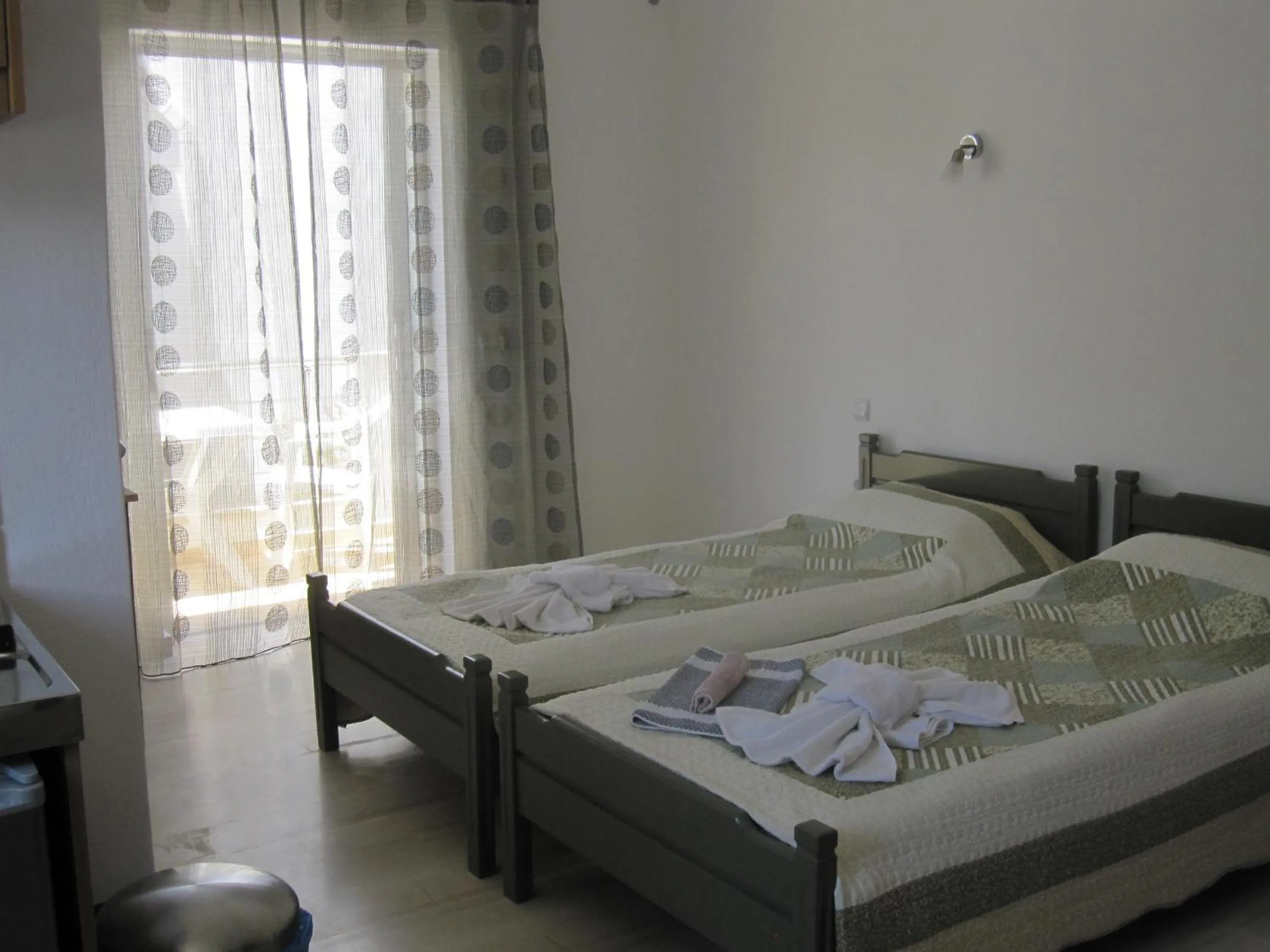 Photo of the whole room, Bed in Lion-Suites