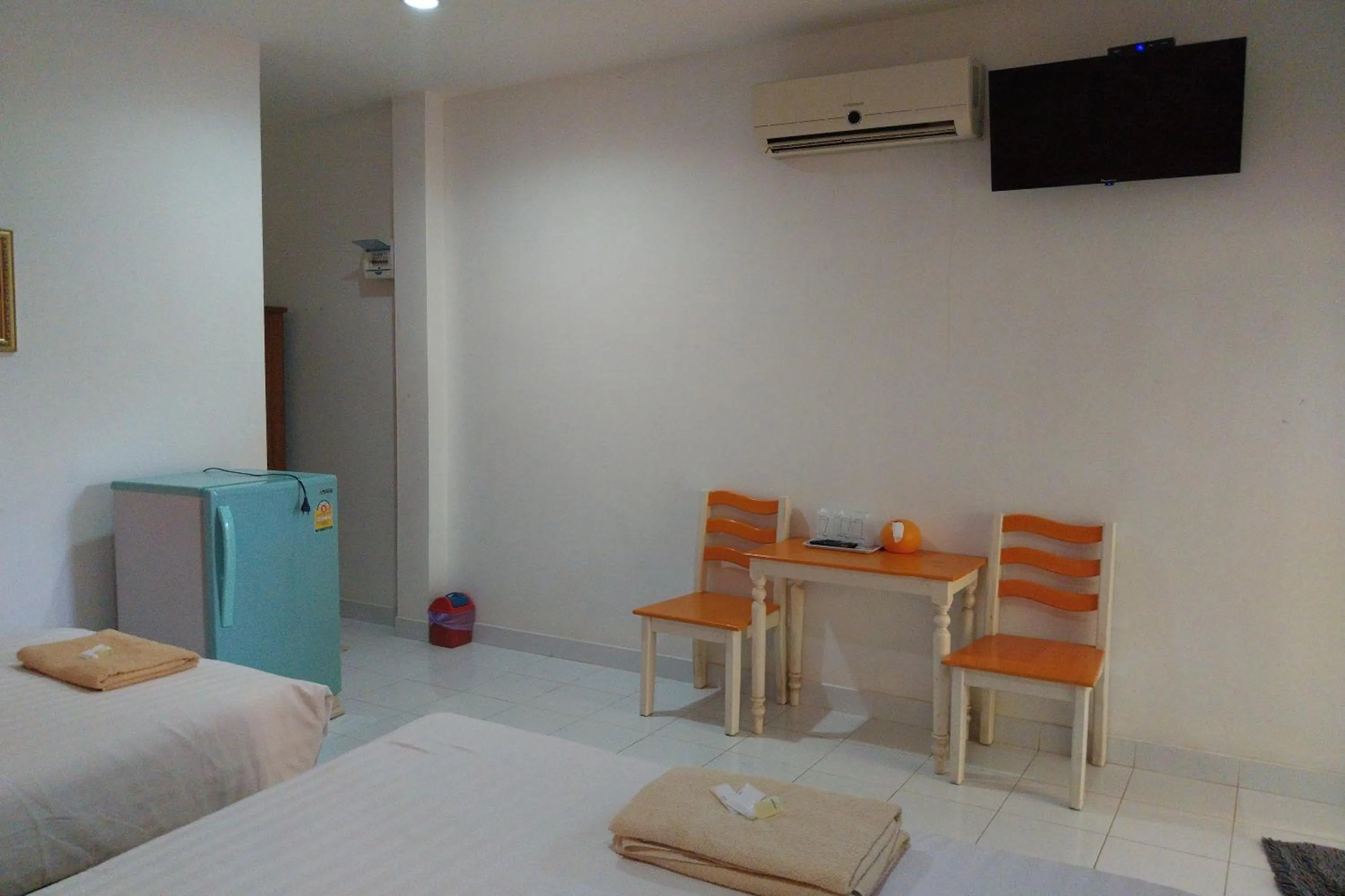 Seating area, Bed in Review Resort