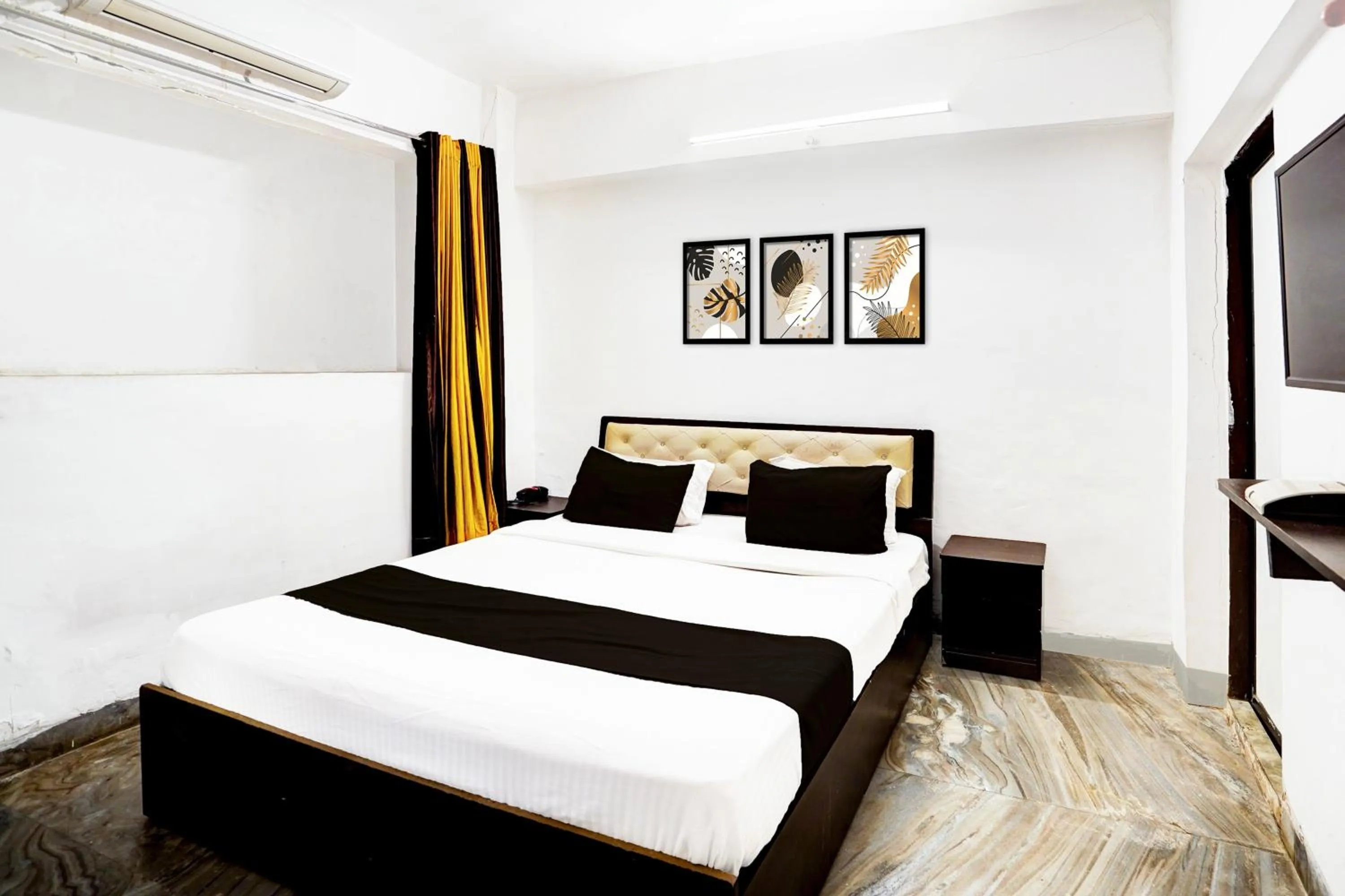 Bedroom in Hotel O Deluxe United Corporate Home