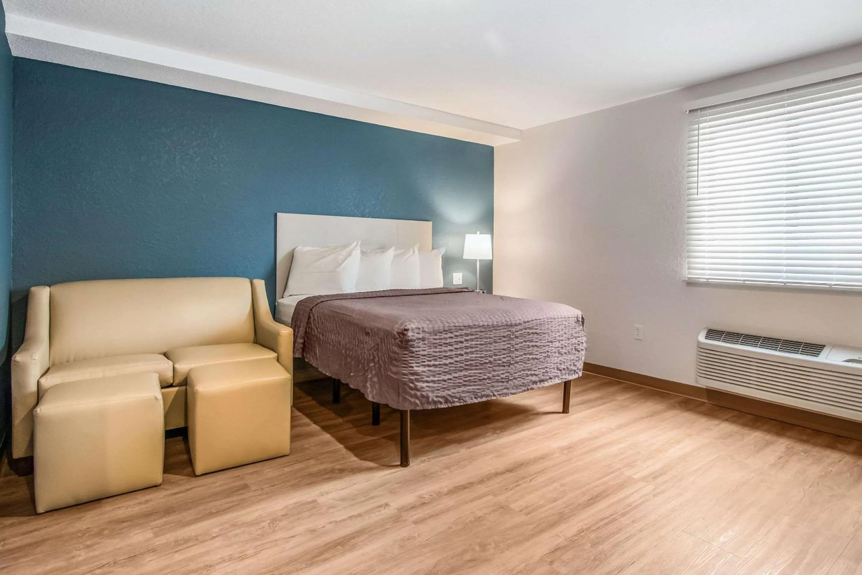 Photo of the whole room, Bed in WoodSpring Suites Doral Miami Airport