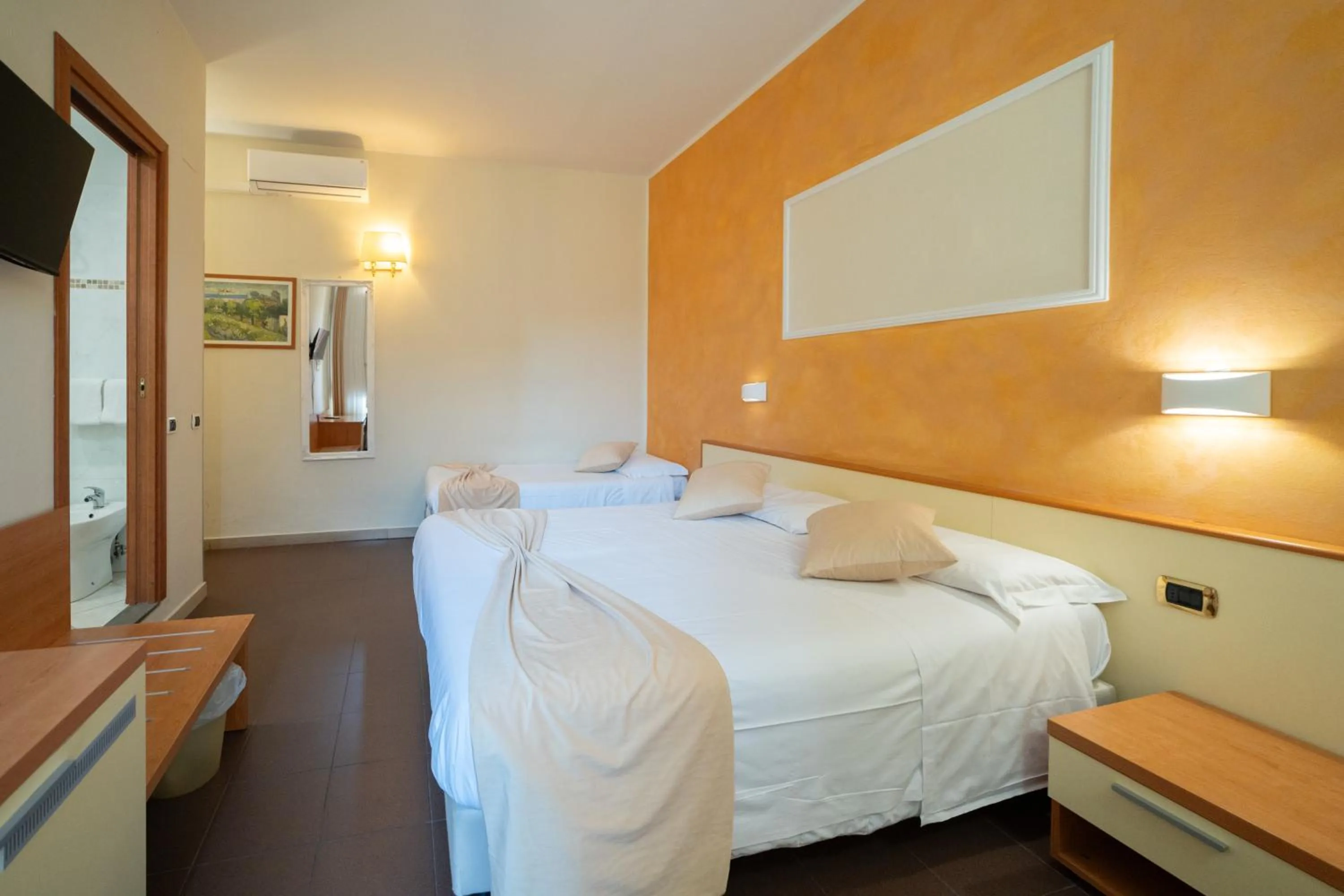 Bed in Hotel Angelica Firenze