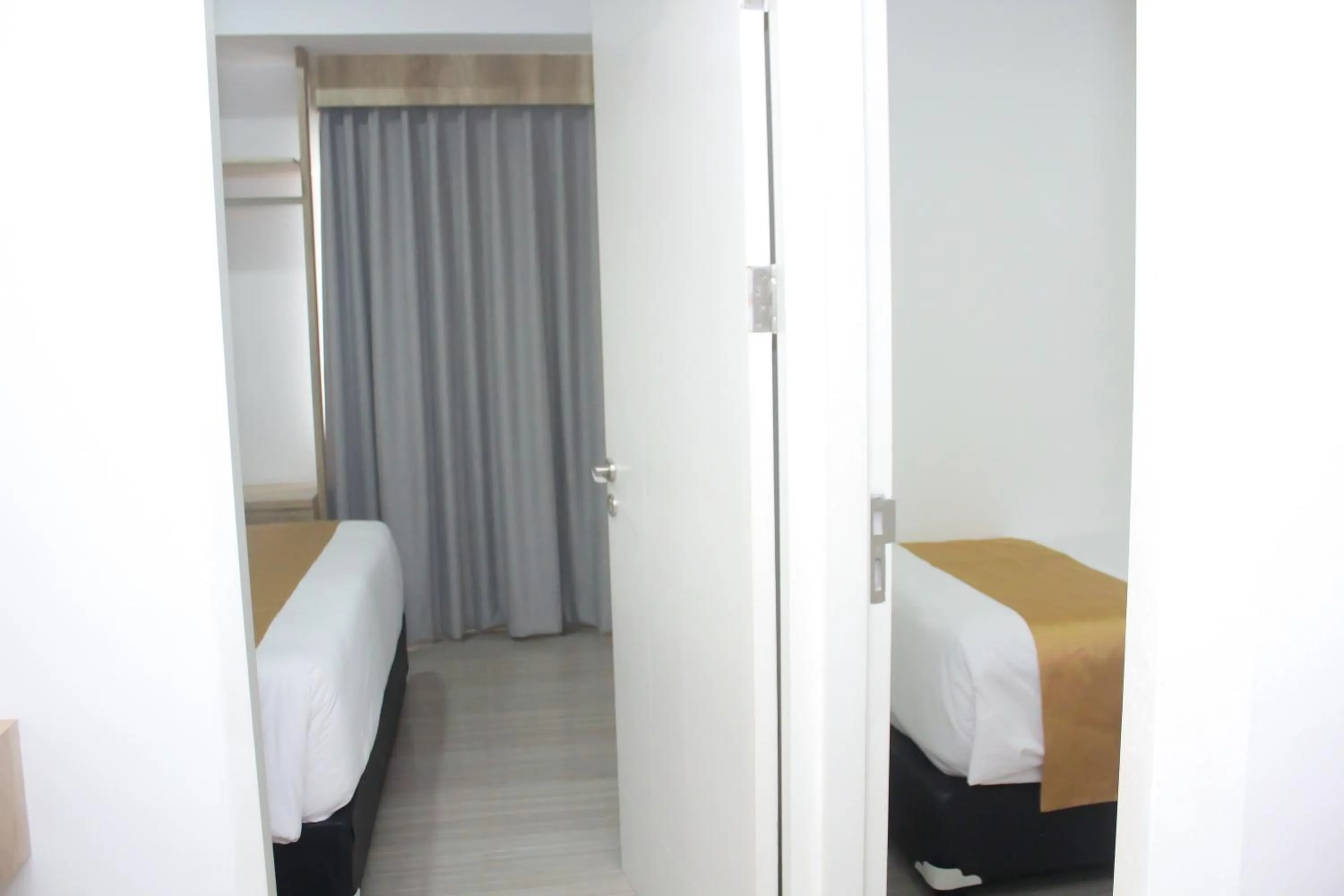 Bed in Urban Hotel Serpong