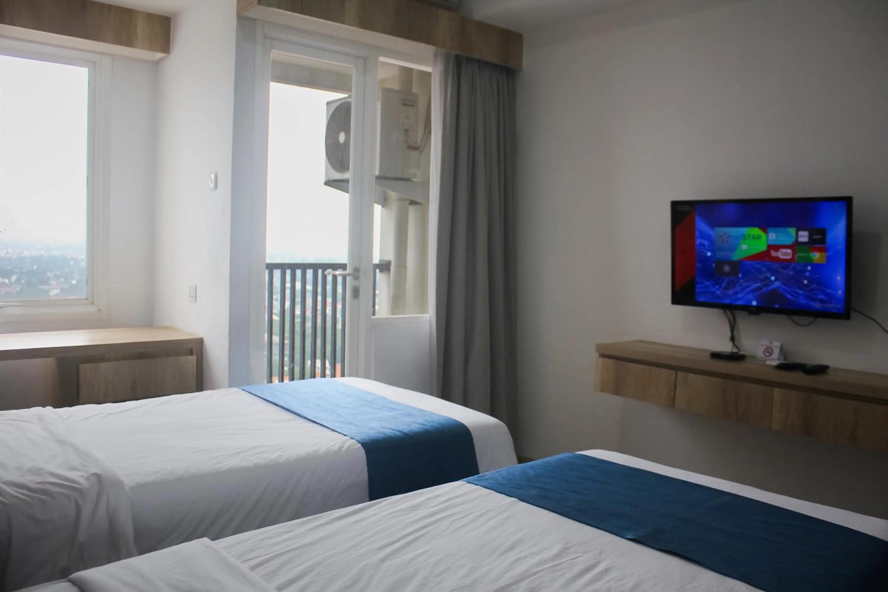 Bed in Urban Hotel Serpong